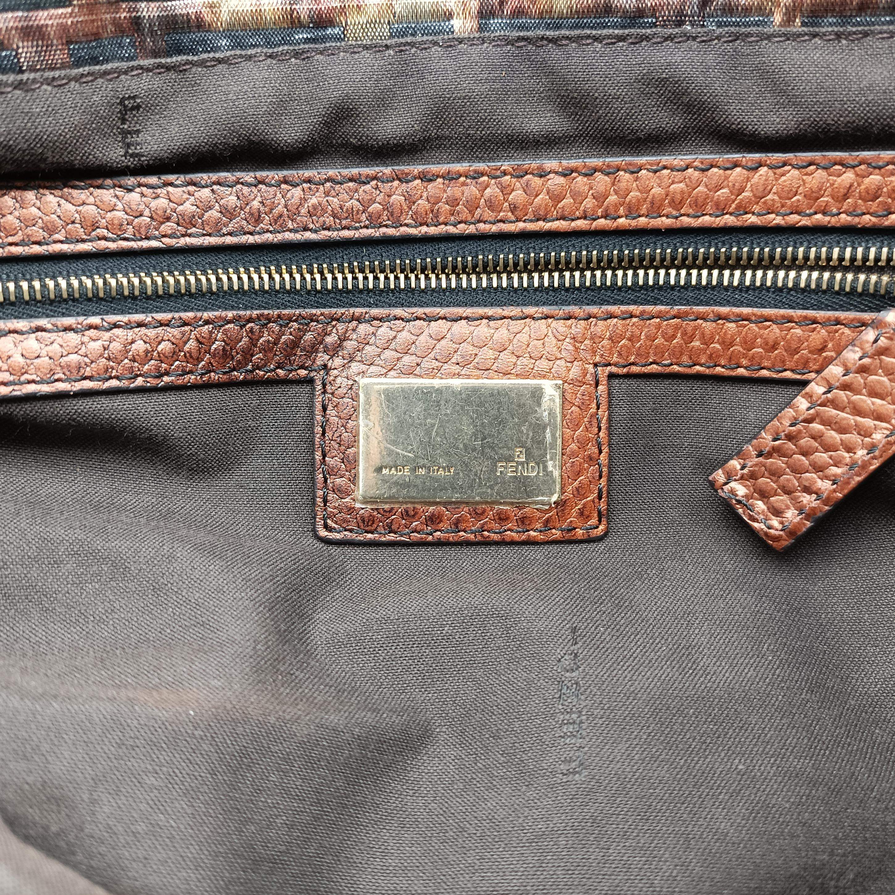 Vintage Fendi Chef Perforated Charm Zucca Print Brown fabric 8BR436 handbag | stylenewstar