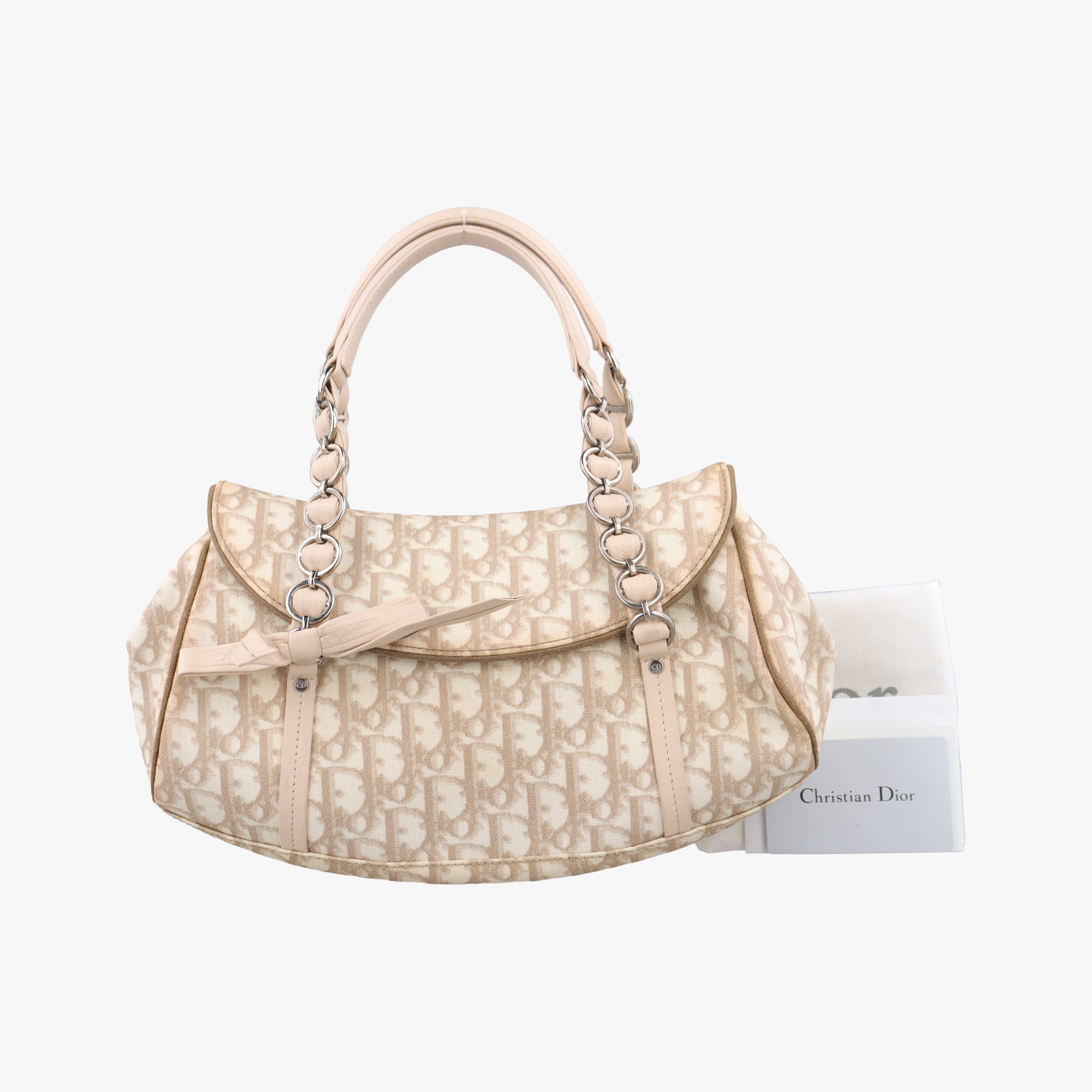 Pre-owned Christian Dior Romantique Trotter Beigex White PVC coated canvas  handbag | stylenewstar