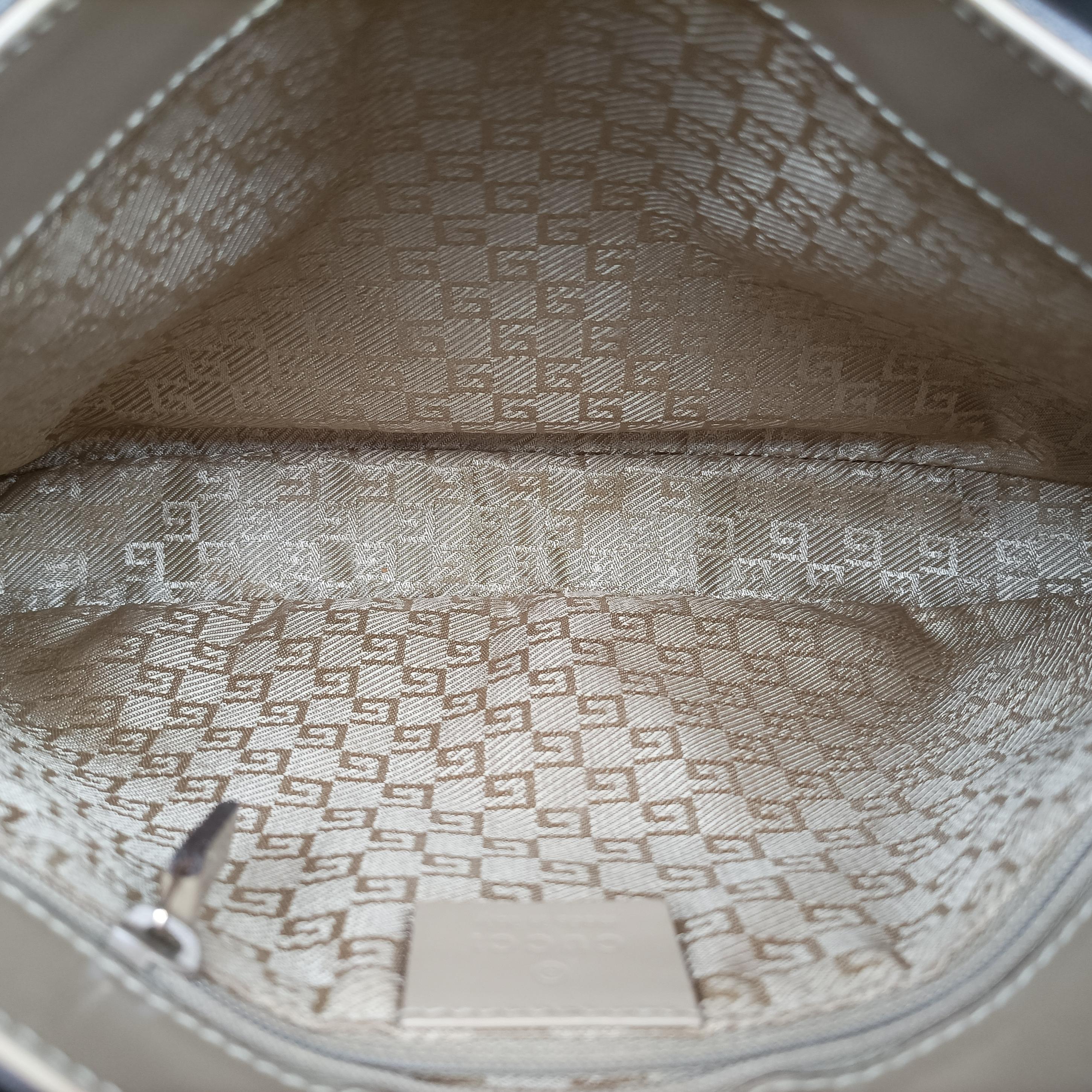 Pre-owned Gucci Jackie beige Leather 001.41 handbag | stylenewstar