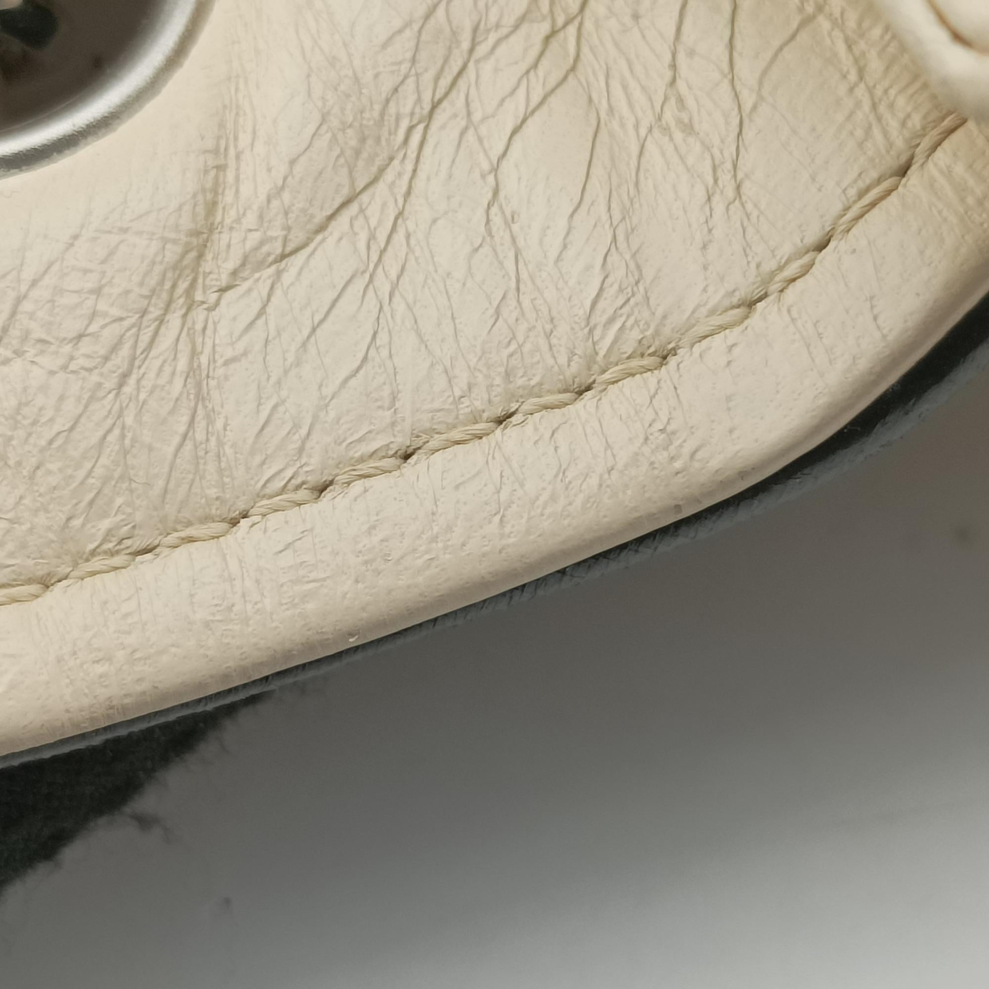 Vintage Chanel East West White lambskin A37691 shoulderbag | stylenewstar