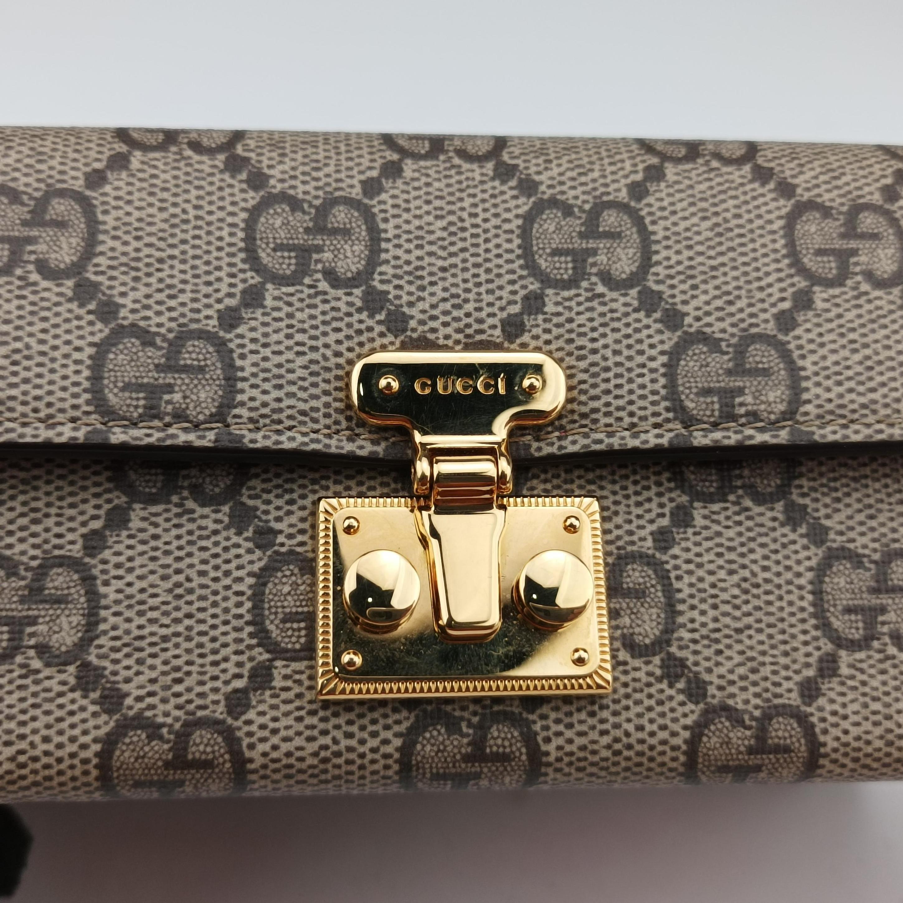 Pre-owned Gucci GG Supreme Brown×Red PVC coated canvas 677610 shoulderbag | stylenewstar