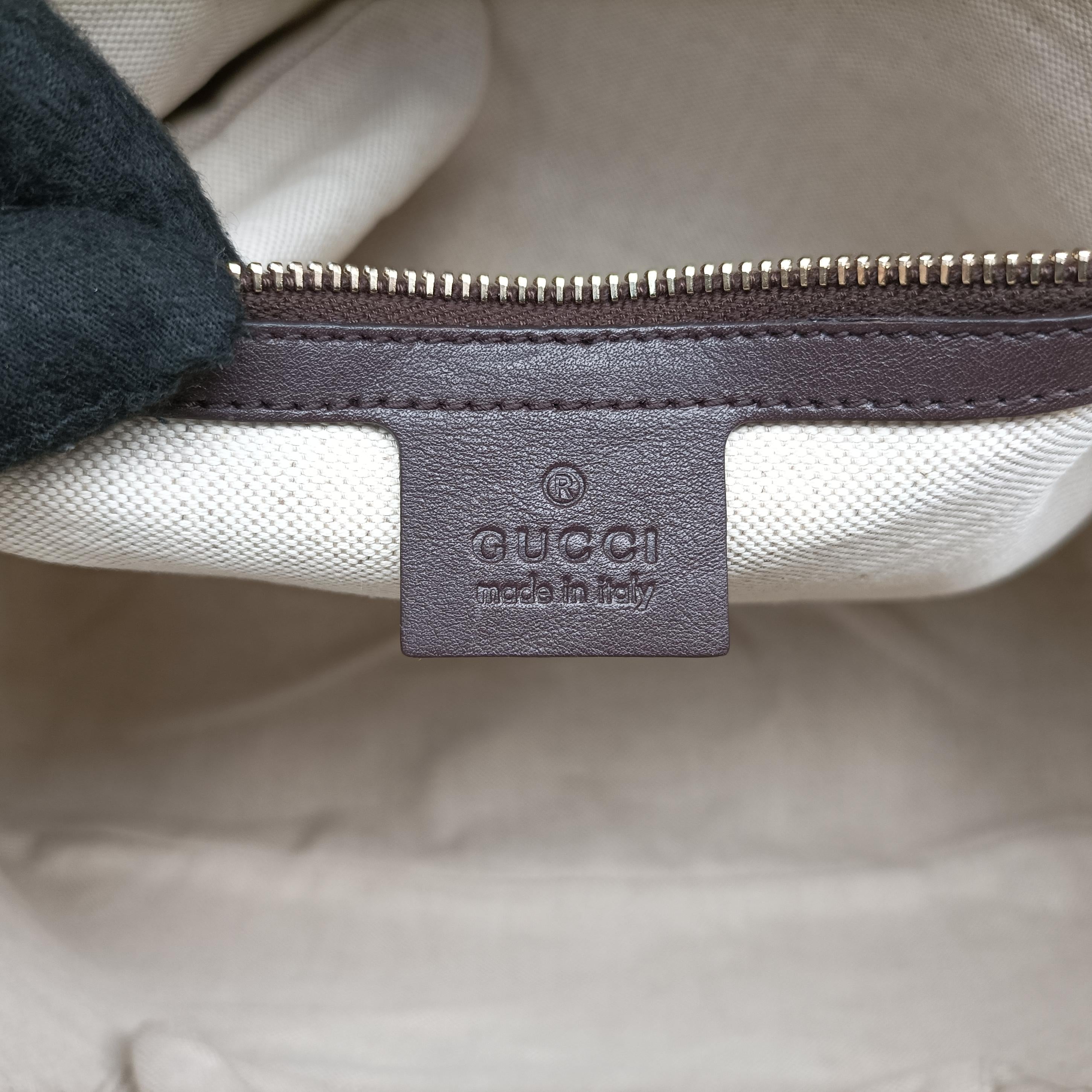 Pre-owned Gucci Microguccissima Brown PVC coated canvas 309616 handbag | stylenewstar