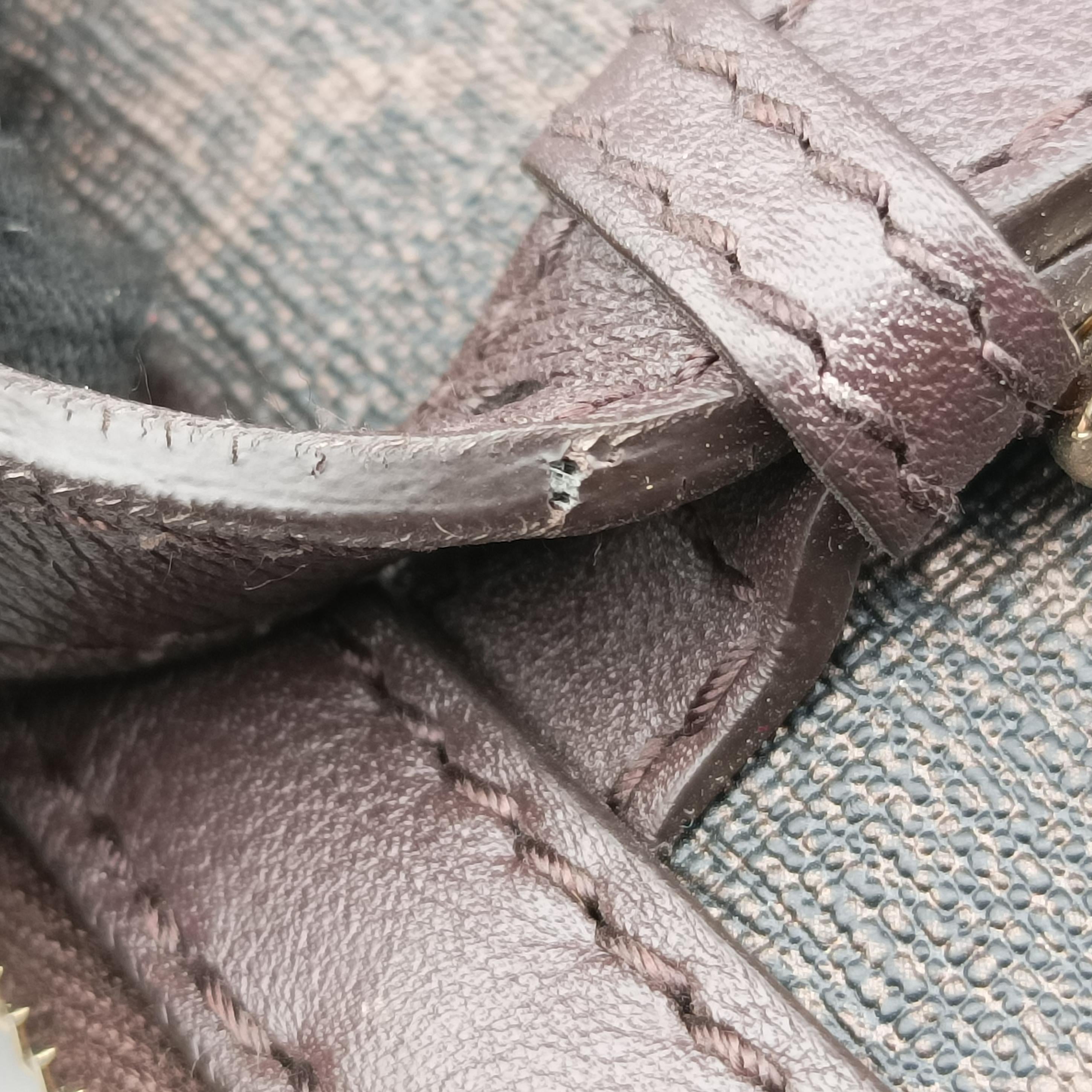 Pre-owned Gucci Microguccissima Brown PVC coated canvas 309616 handbag | stylenewstar