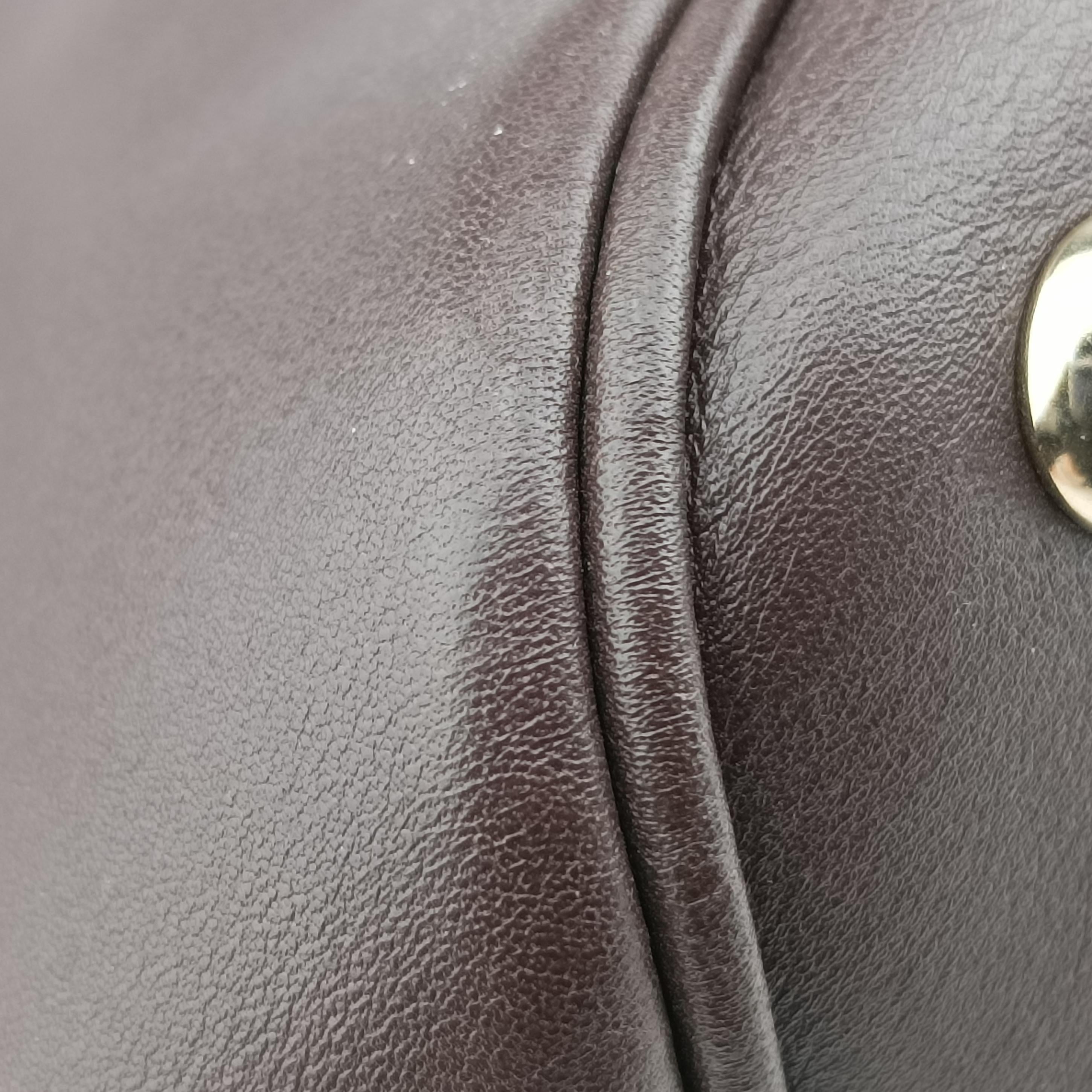 Pre-owned Gucci Microguccissima Brown PVC coated canvas 309616 handbag | stylenewstar