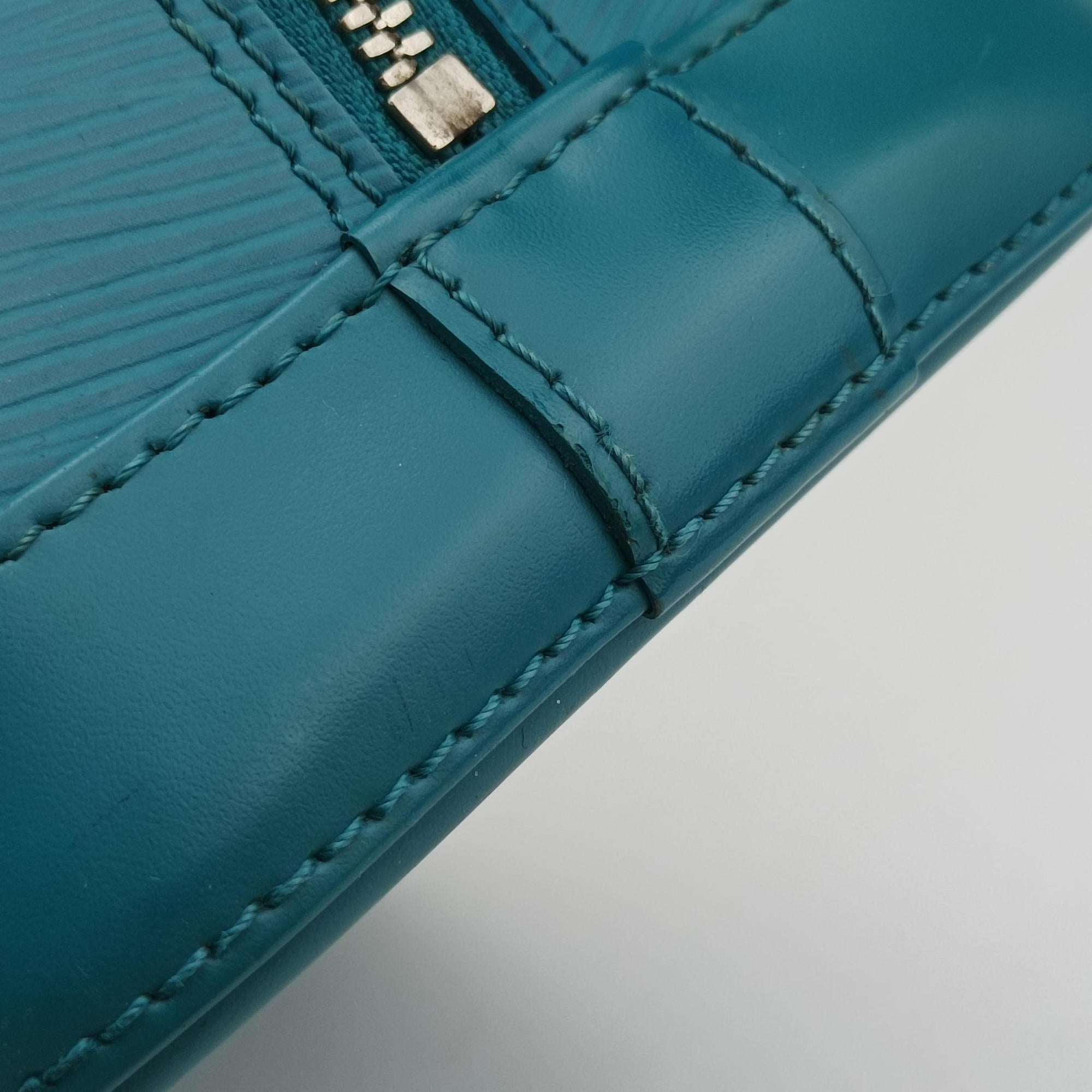 Pre-owned Louis Vuitton Alma PM CYAN Epi M40624 handbag | stylenewstar