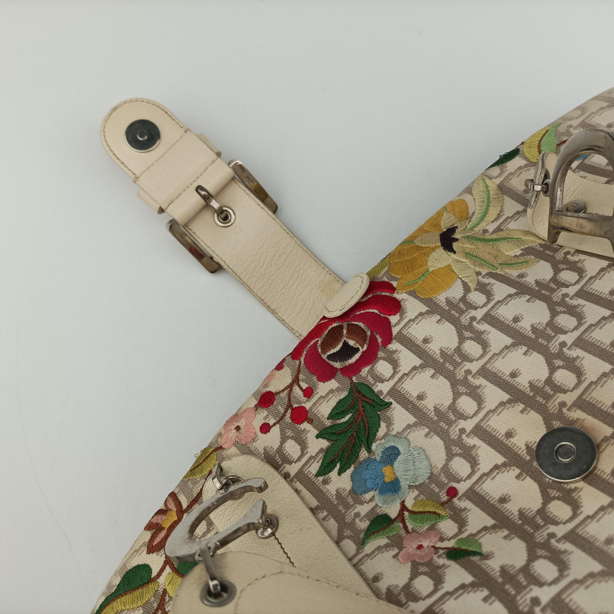 Pre-owned Christian Dior Oblique Floral Trotter White x Beige x Multicolor Canvas × Leather  handbag | stylenewstar