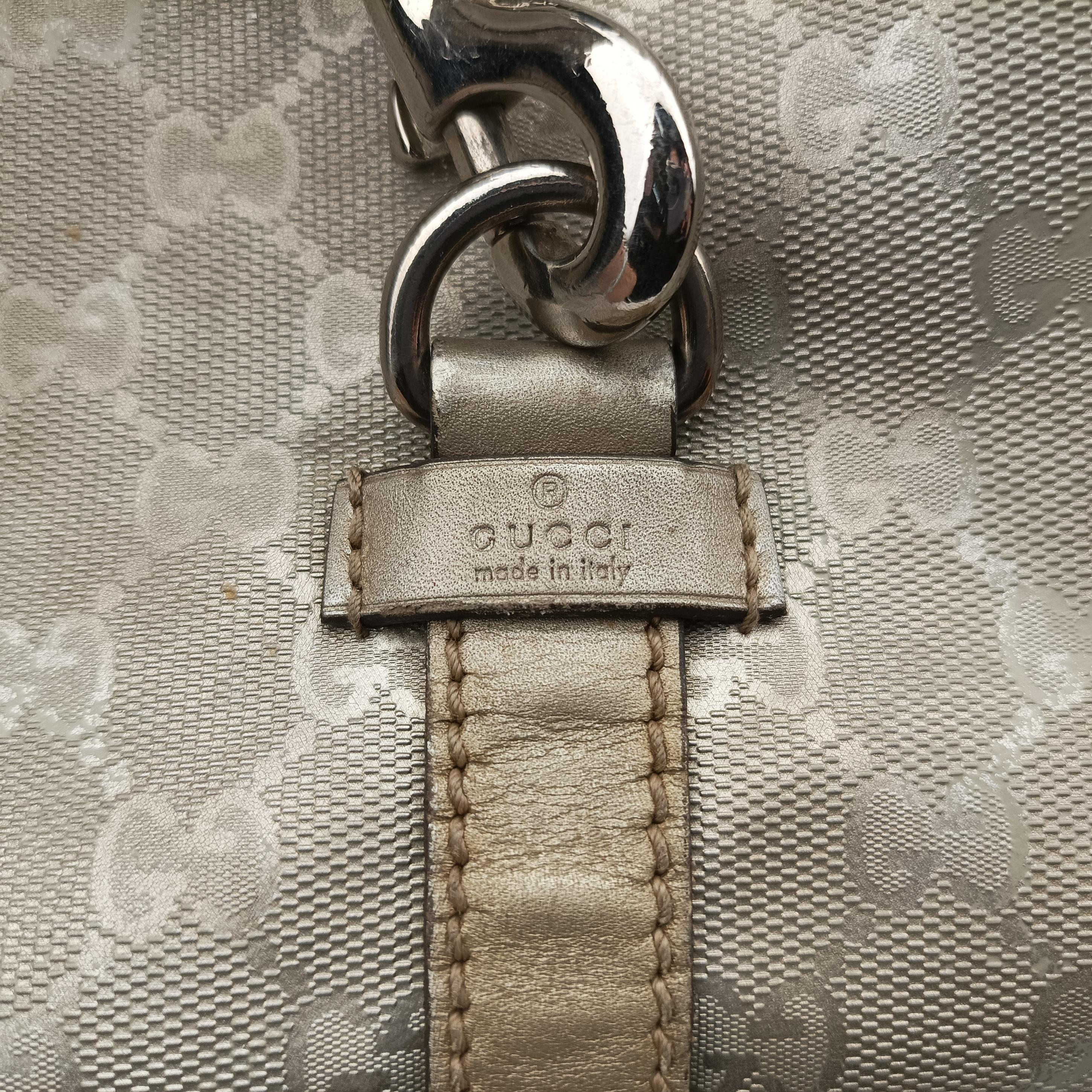 Secondhand Gucci Jackie Silver PVC coated canvas 203494 handbag | stylenewstar