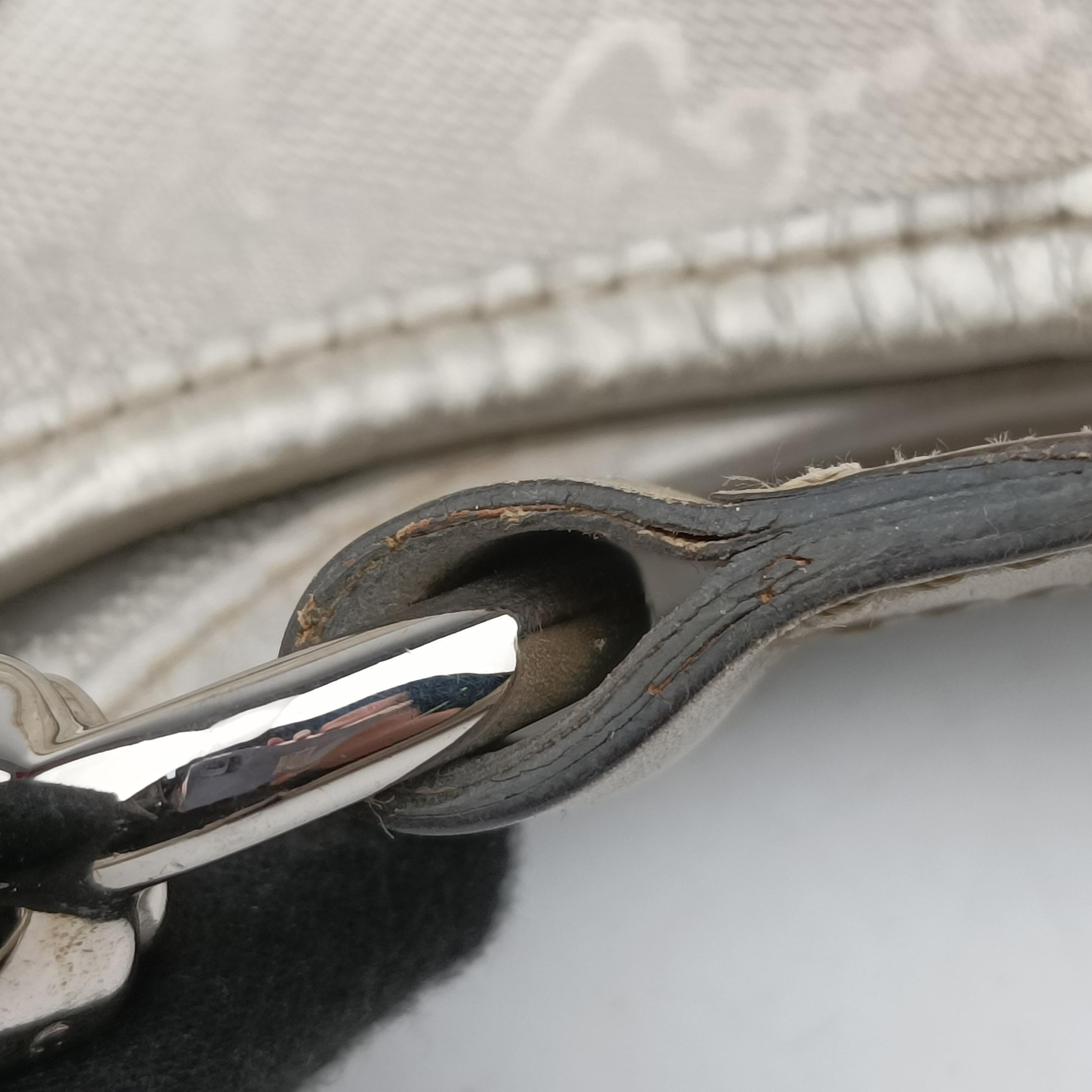 Secondhand Gucci Jackie Silver PVC coated canvas 203494 handbag | stylenewstar