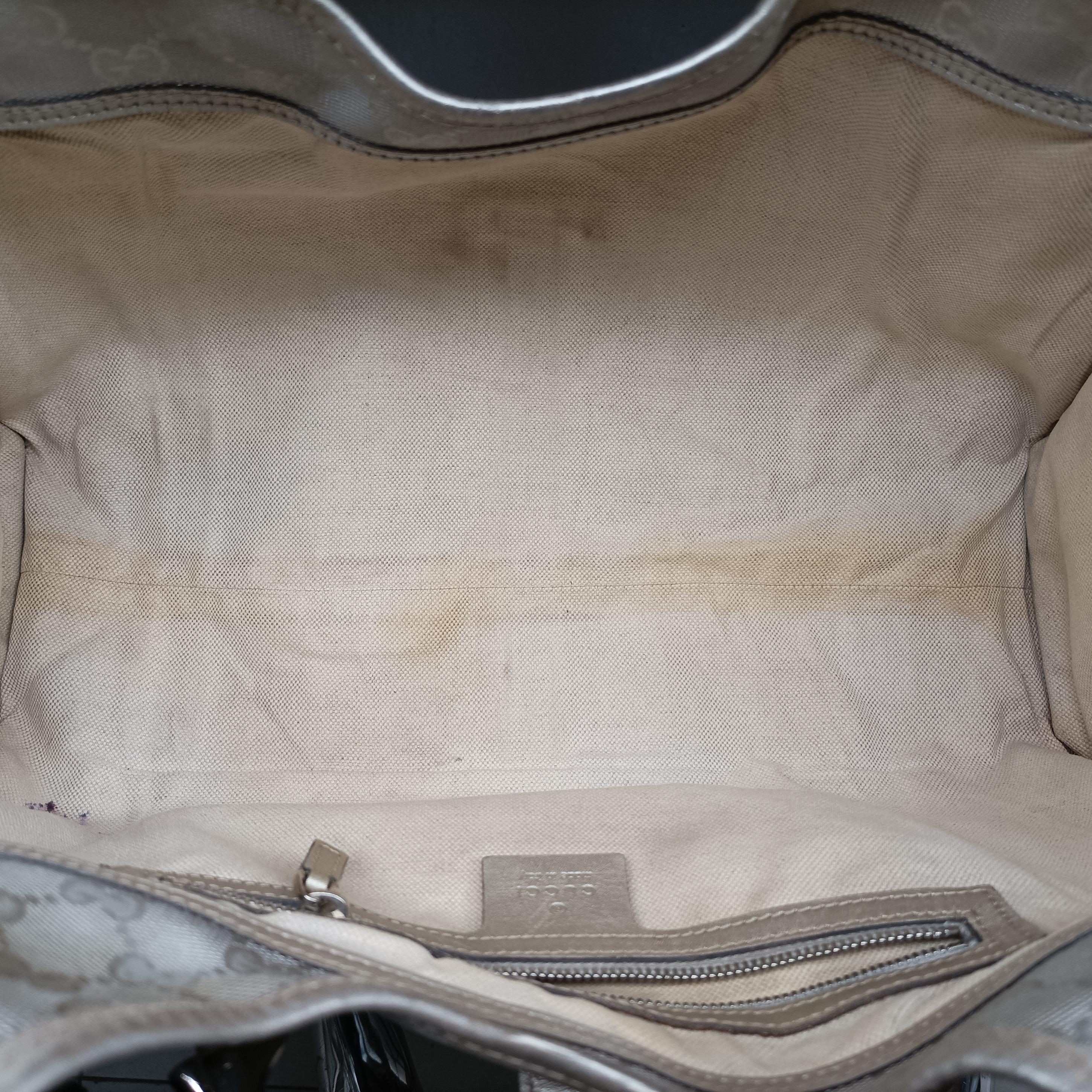 Secondhand Gucci Jackie Silver PVC coated canvas 203494 handbag | stylenewstar