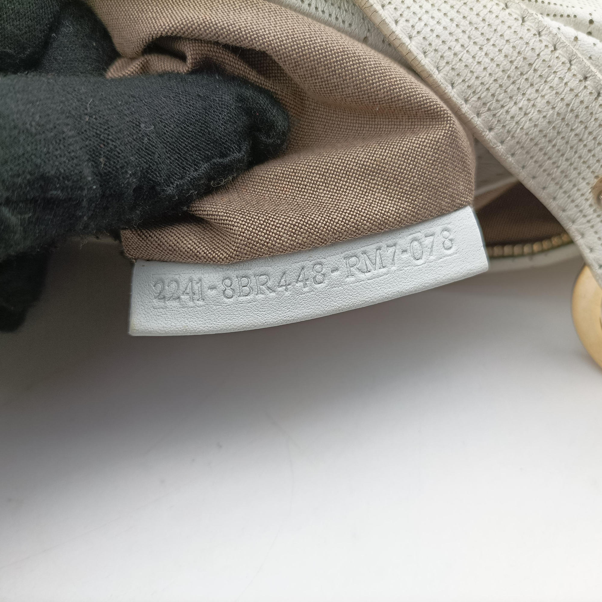 Secondhand Fendi Chef Perforated Charm Zucca Print White Leather 8BR448 handbag | stylenewstar