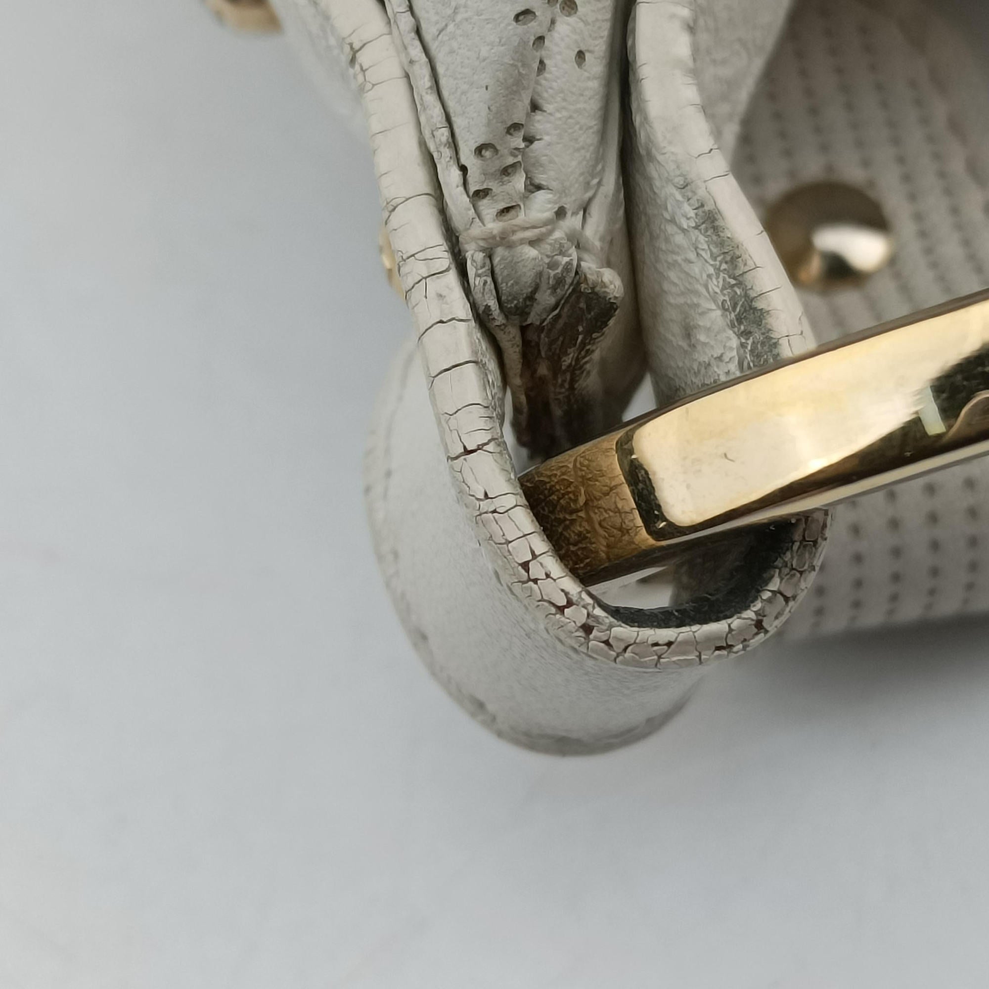 Secondhand Fendi Chef Perforated Charm Zucca Print White Leather 8BR448 handbag | stylenewstar