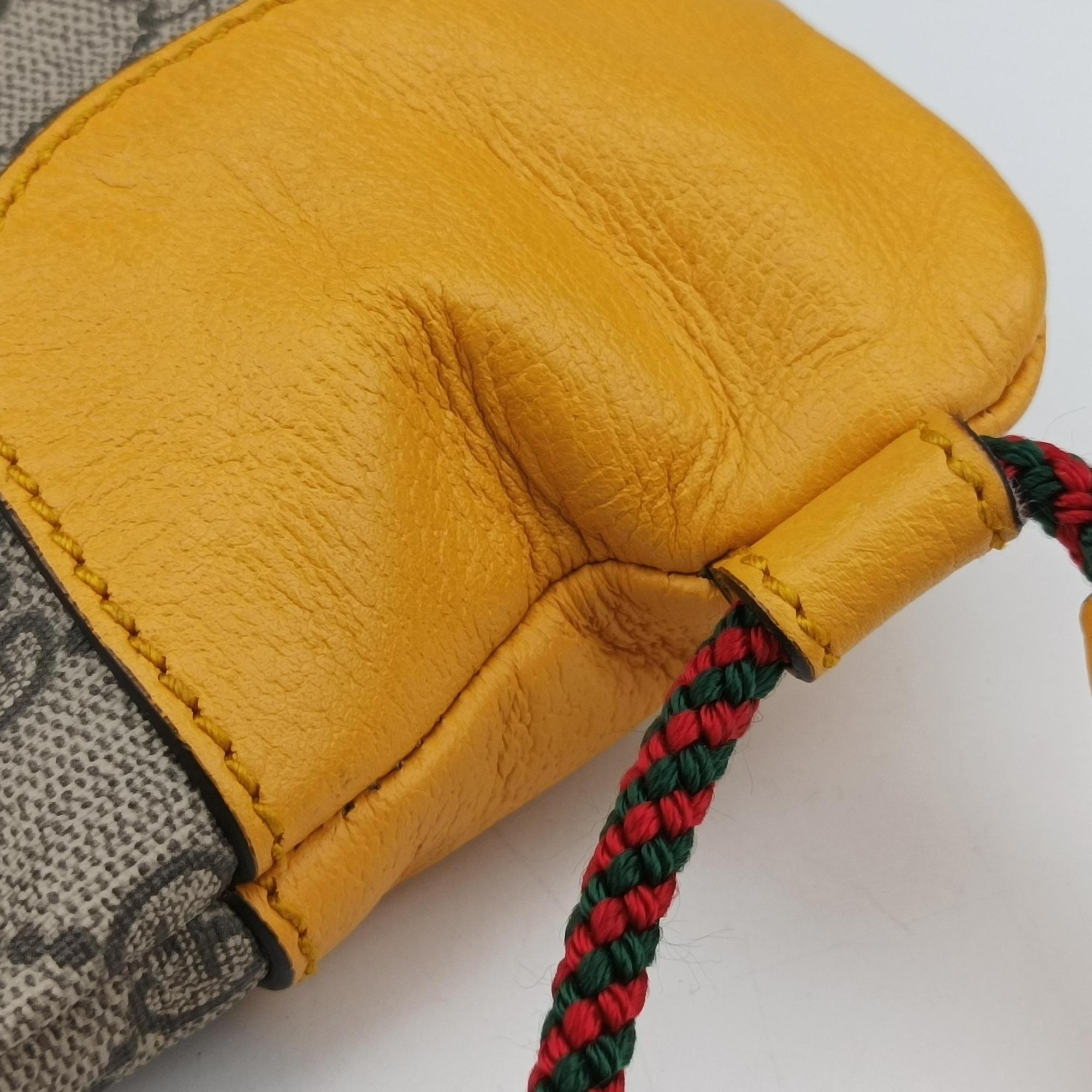 Pre-owned Gucci GG Supreme drawstring Beige×yellow PVC coated canvas×Leather 473872 shoulderbag | stylenewstar