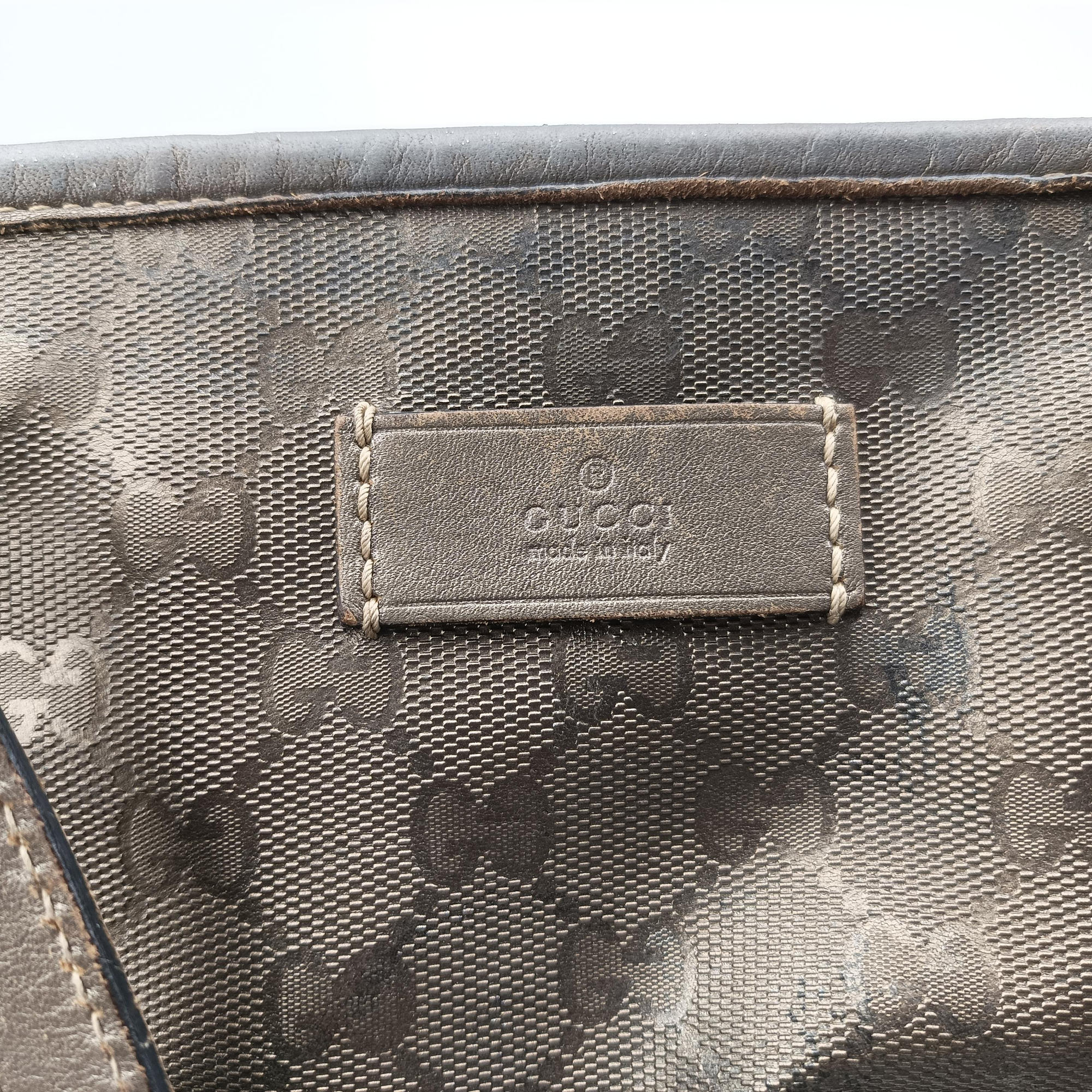 Pre-owned Gucci Guccissima GG Imprime golden PVC coated canvas x leather 211120 handbag | stylenewstar