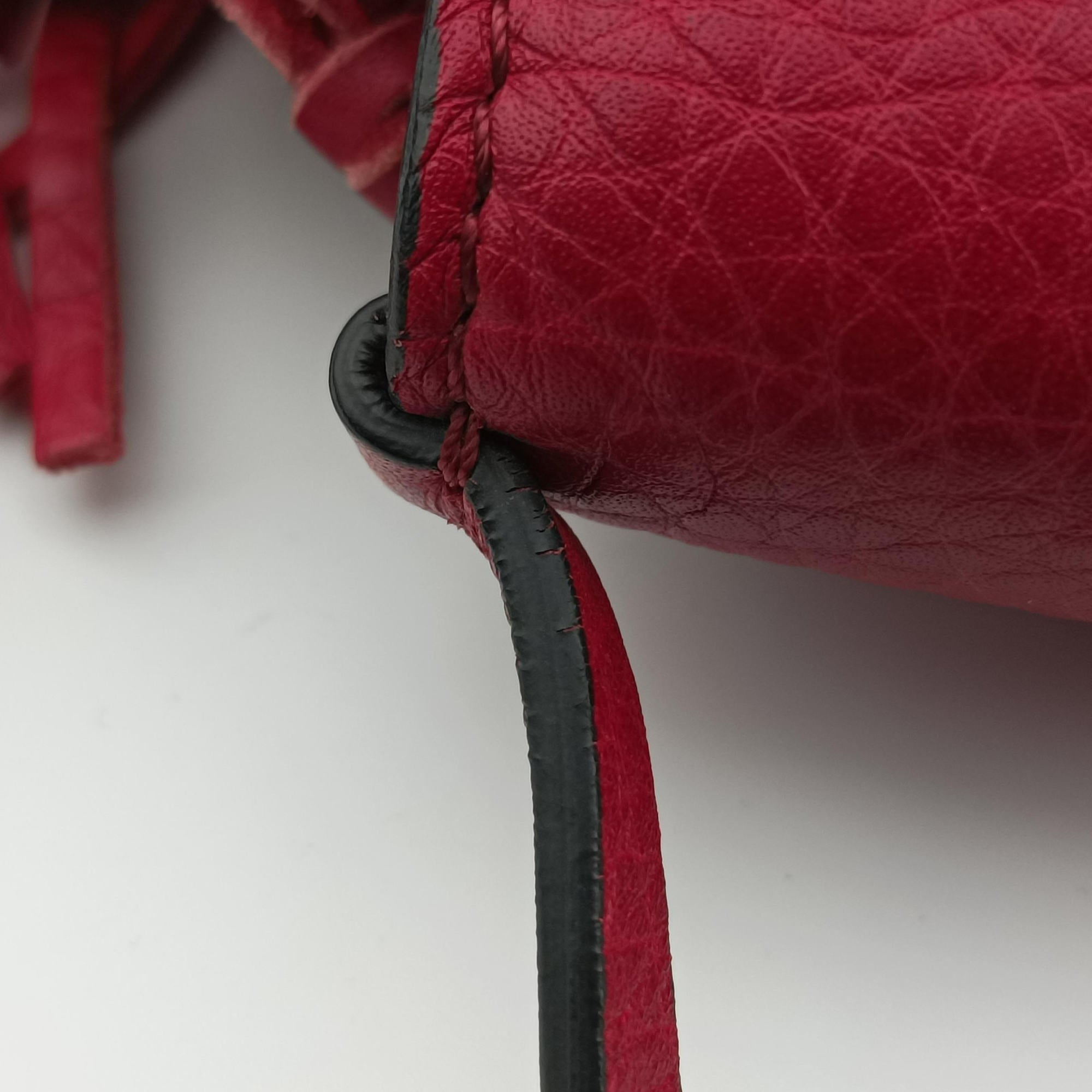 Vintage Valentino Griffin Fringe Red Leather  handbag | stylenewstar