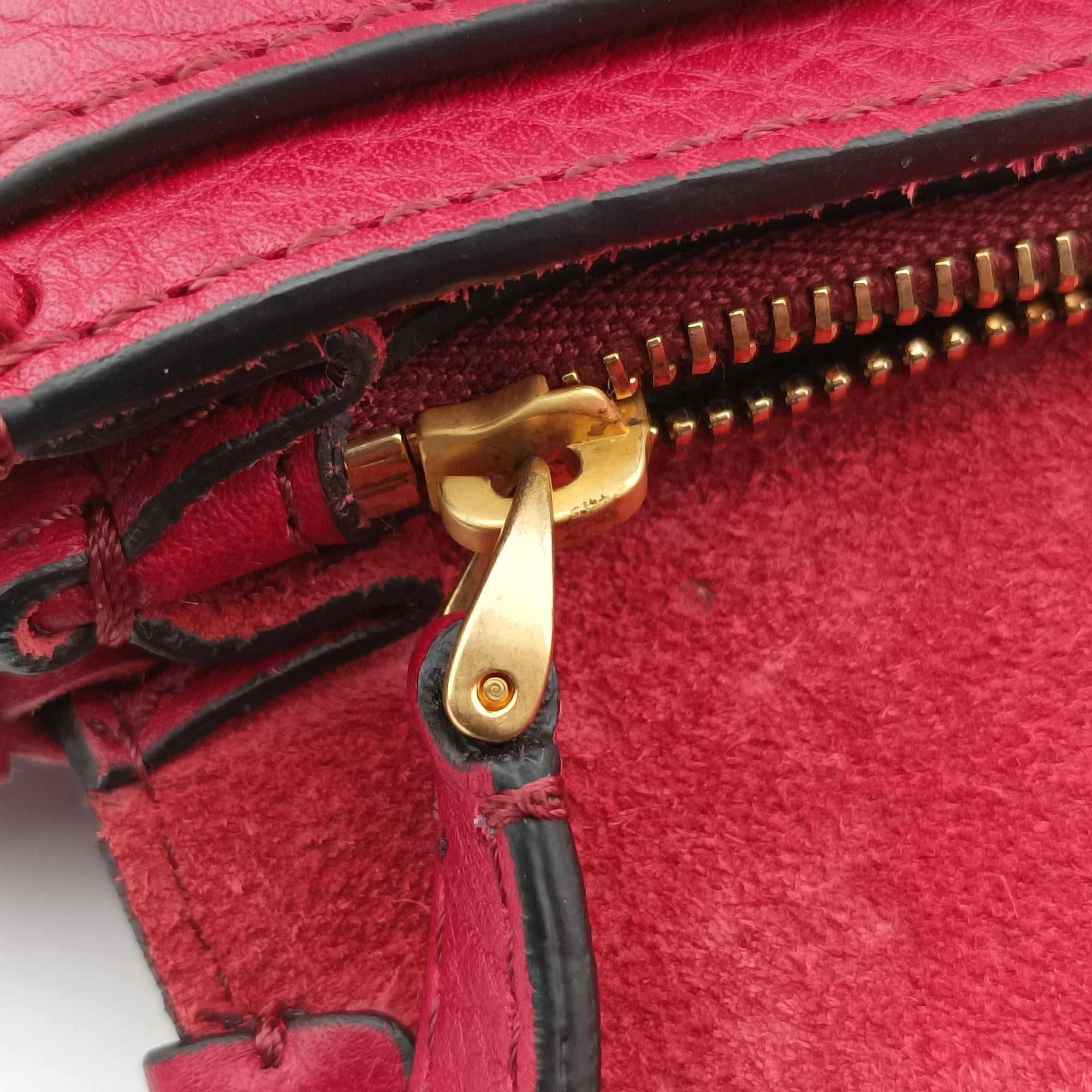Vintage Valentino Griffin Fringe Red Leather  handbag | stylenewstar