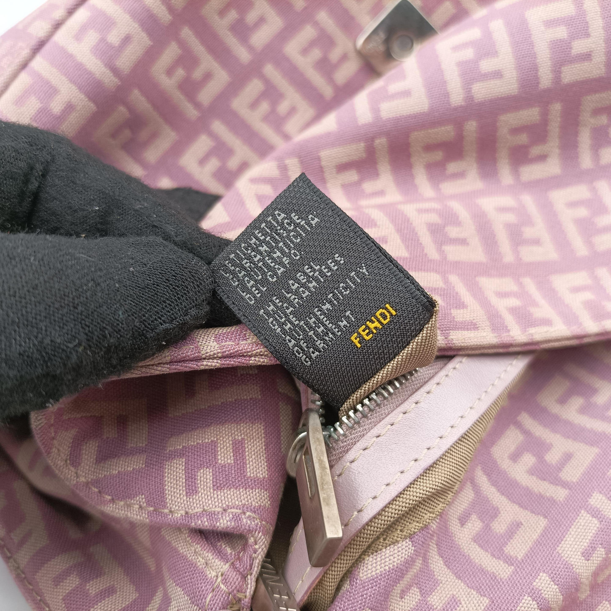 Pre-owned Fendi Zucchino Baguette Pink canvas 8BR003 handbag | stylenewstar