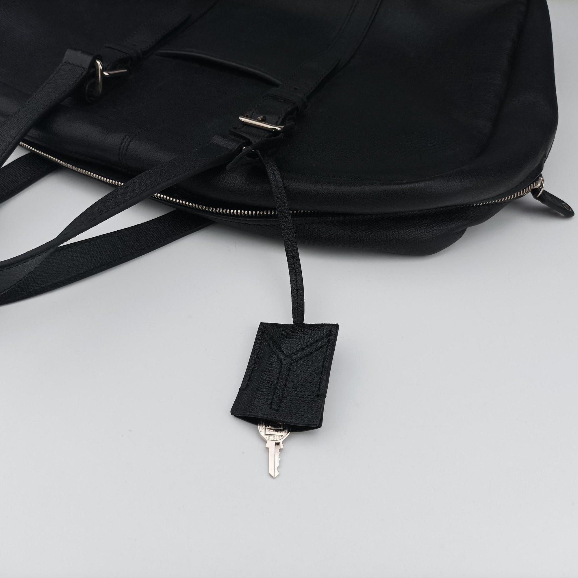 Pre-owned Yves Saint Laurent business Black Leather  handbag | stylenewstar