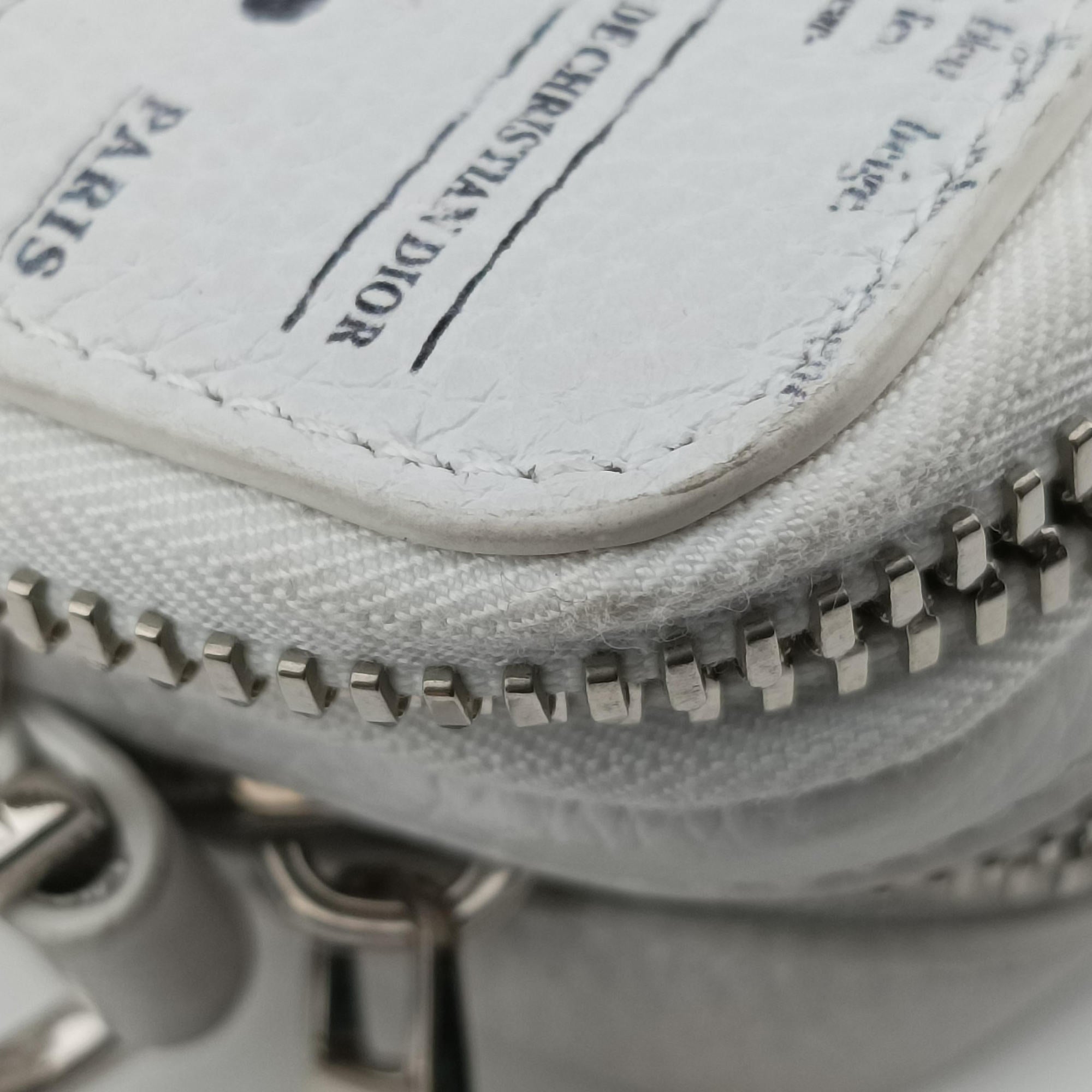 Pre-owned Christian Dior Daniel Arsham collaboration Newspaper Print White Leather  shoulderbag | stylenewstar