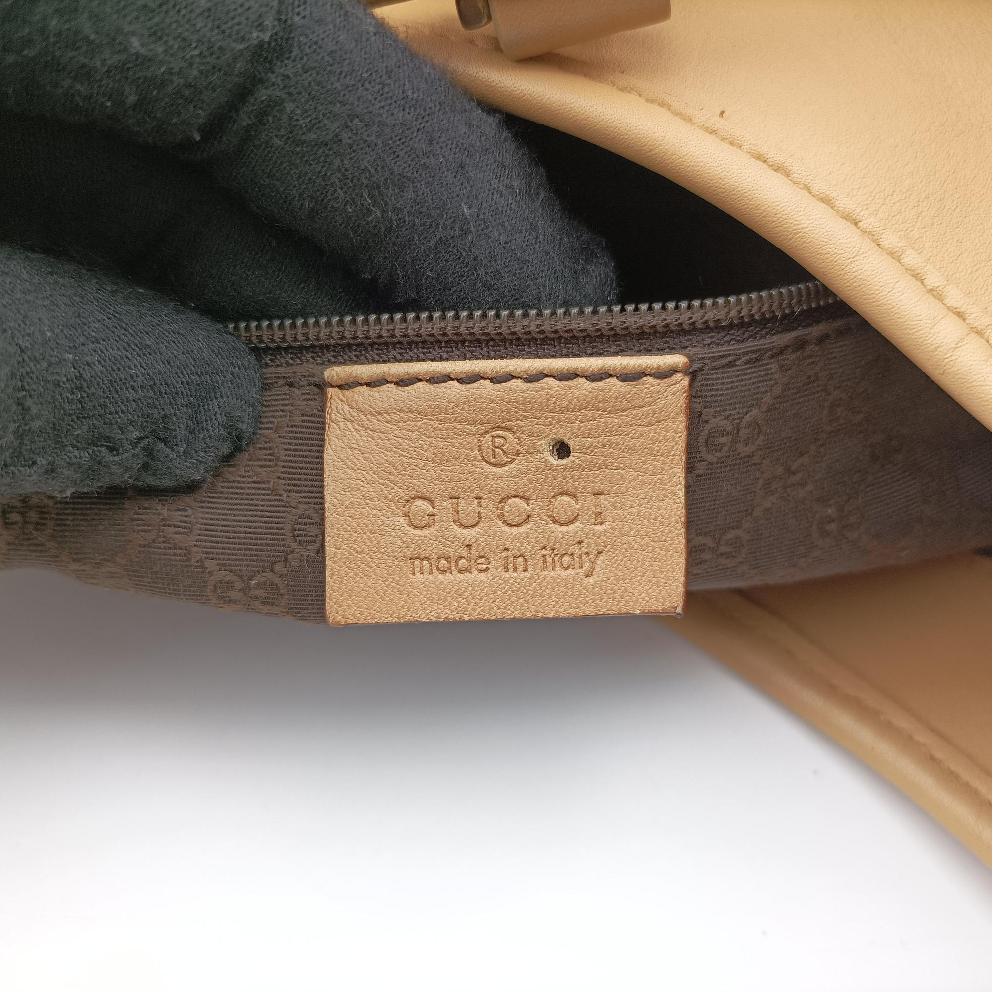Vintage Gucci Perforated Jackie Camel Leather 92736 handbag | stylenewstar