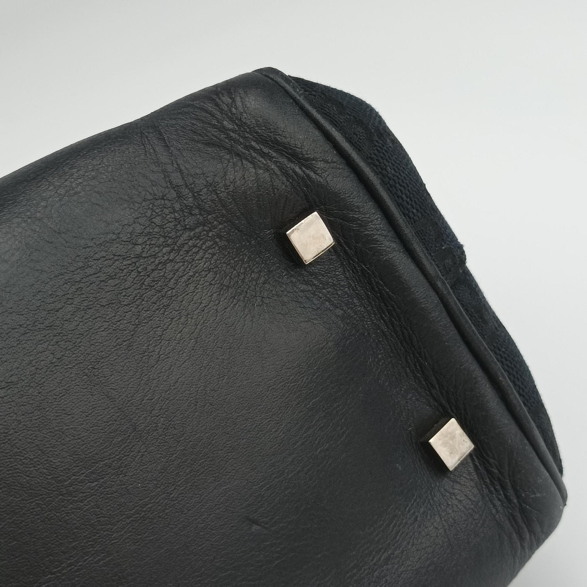 Vintage Gucci GG Canvas Black Jacquard Canvas × Calf Leather 002.11 handbag | stylenewstar
