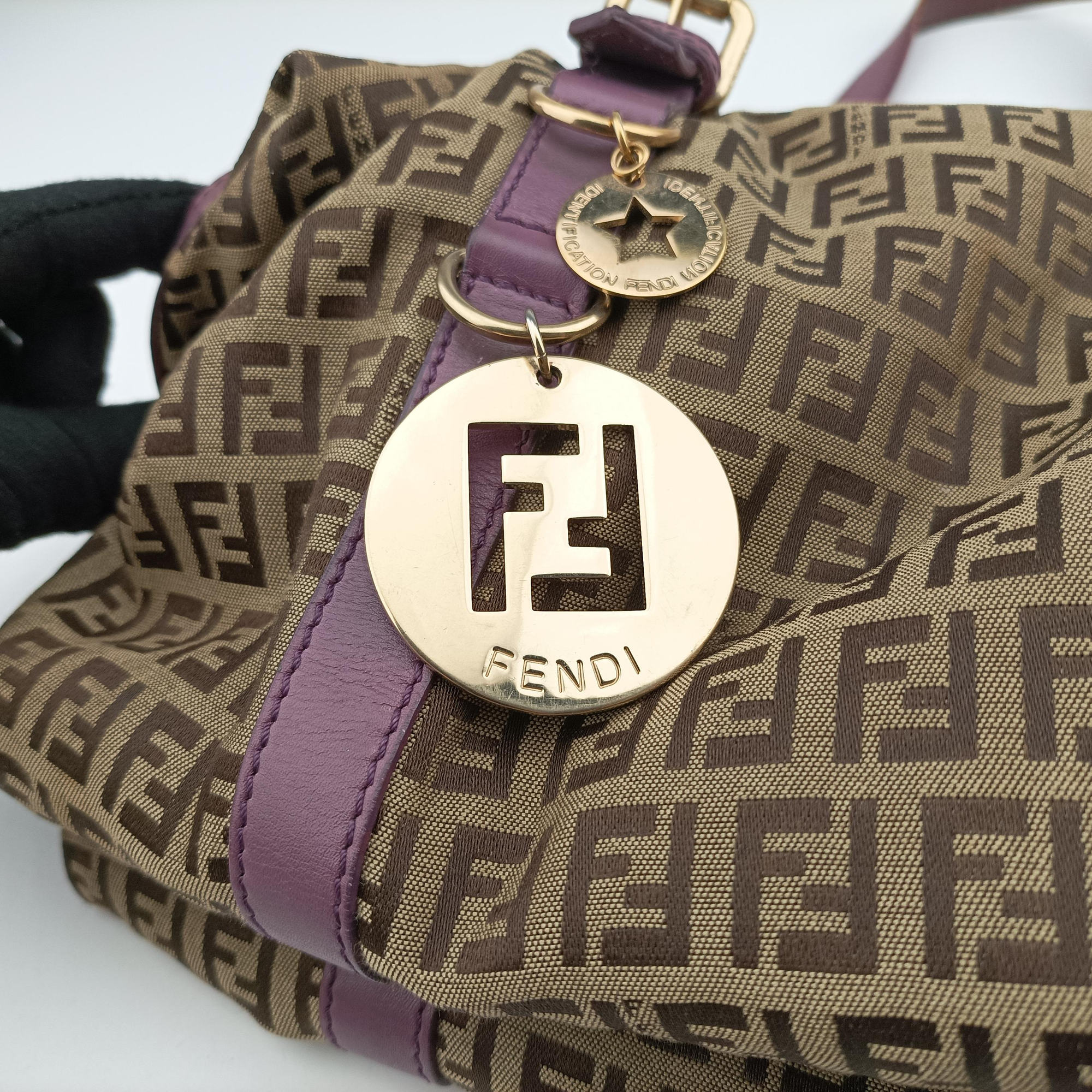 Pre-owned Fendi Zucchino Glitter Logo Tobacco × Purple × Magenta Canvas × Leather 8BL106 handbag | stylenewstar