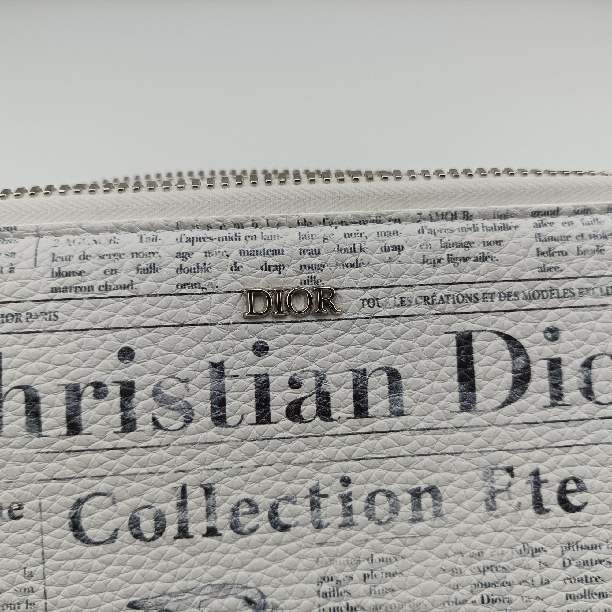 Secondhand Christian Dior Daniel Arsham collaboration Newspaper Print White Leather  shoulderbag | stylenewstar