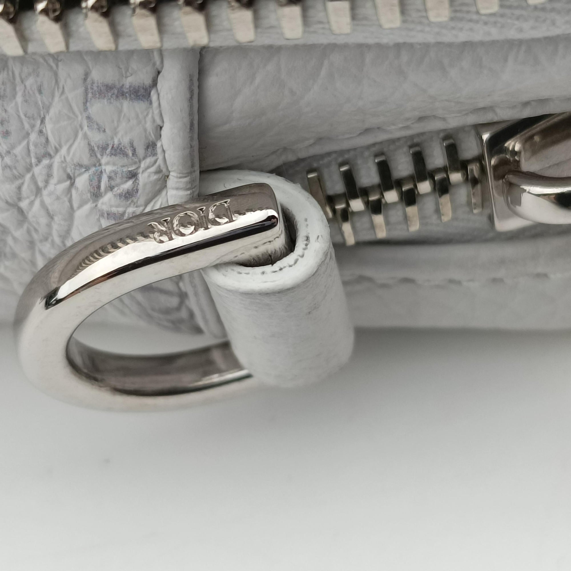 Secondhand Christian Dior Daniel Arsham collaboration Newspaper Print White Leather  shoulderbag | stylenewstar