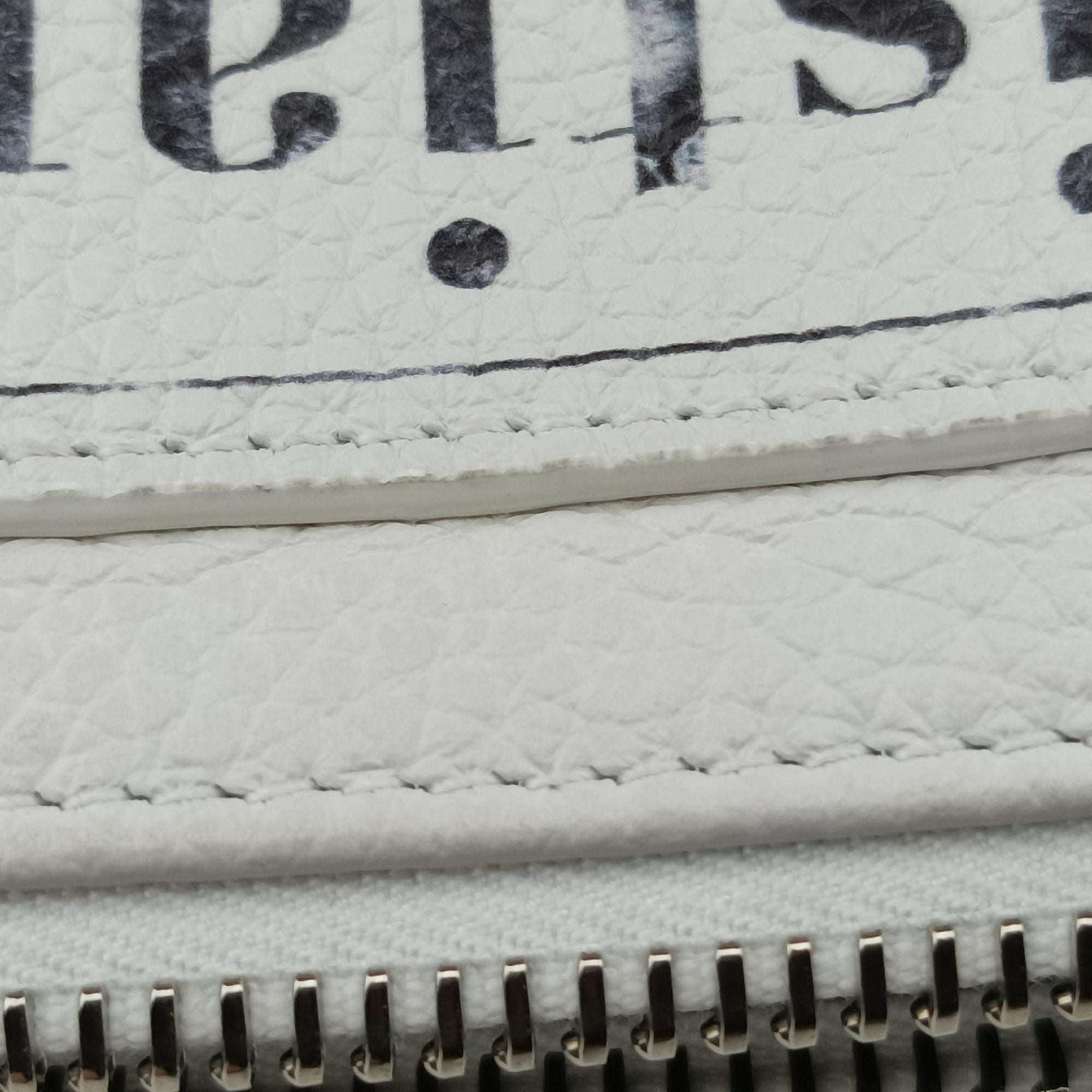 Secondhand Christian Dior Daniel Arsham collaboration Newspaper Print White Leather  shoulderbag | stylenewstar