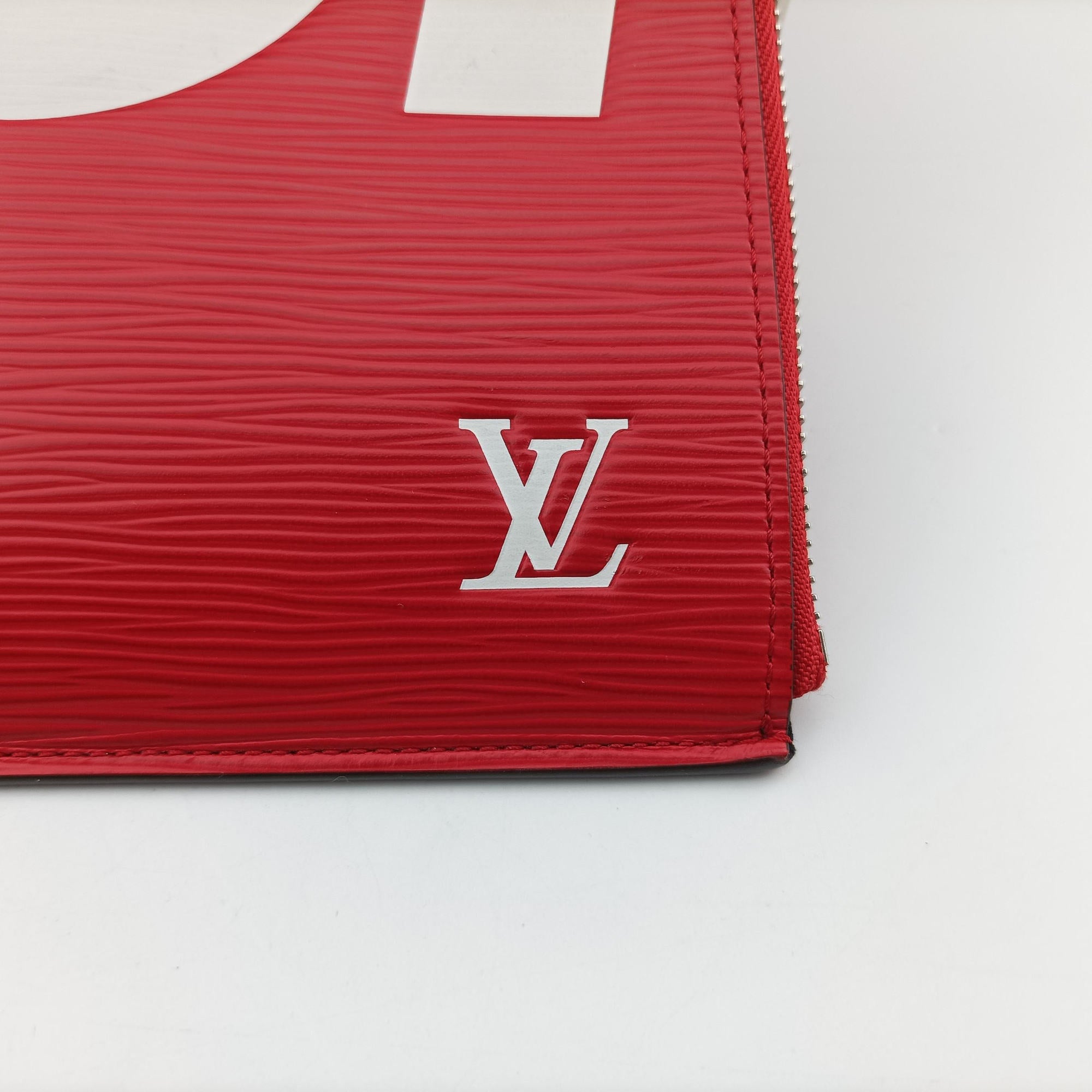 Pre-owned Louis Vuitton Pochette Jour GM Supreme Collaboration Rouge×White epi M67722 clutchbag | stylenewstar