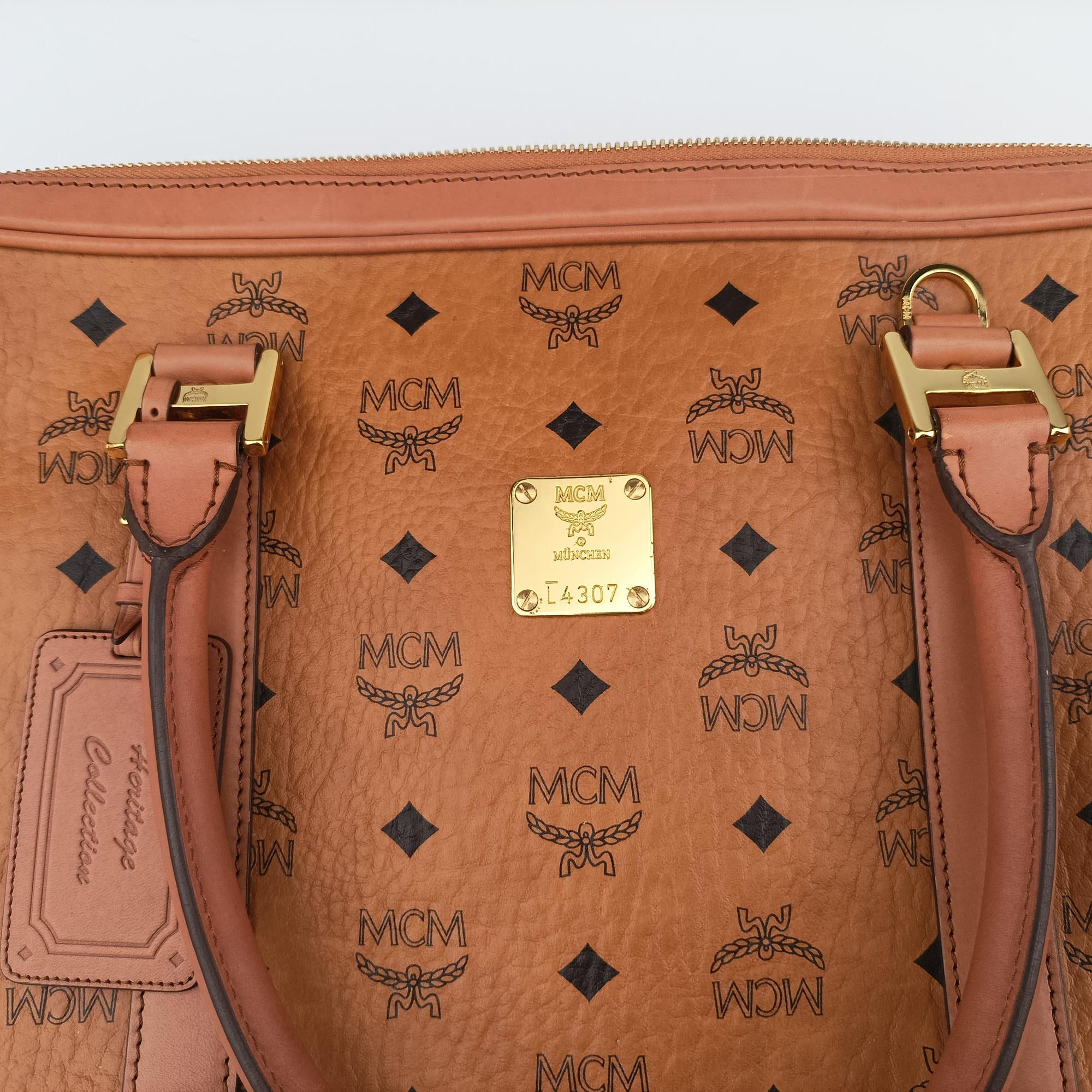 Vintage MCM Logogram business Brown Leather  handbag | stylenewstar