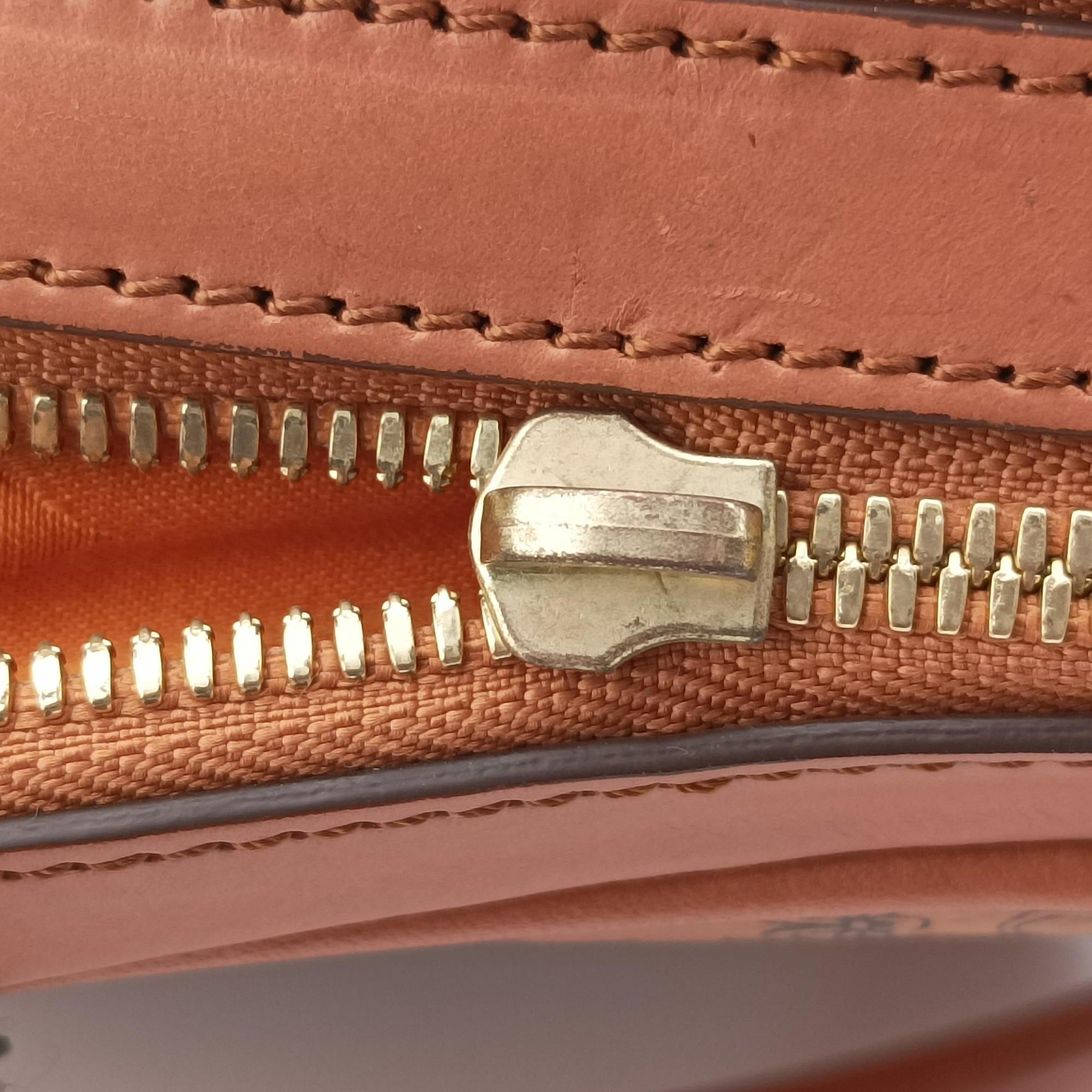 Vintage MCM Logogram business Brown Leather  handbag | stylenewstar