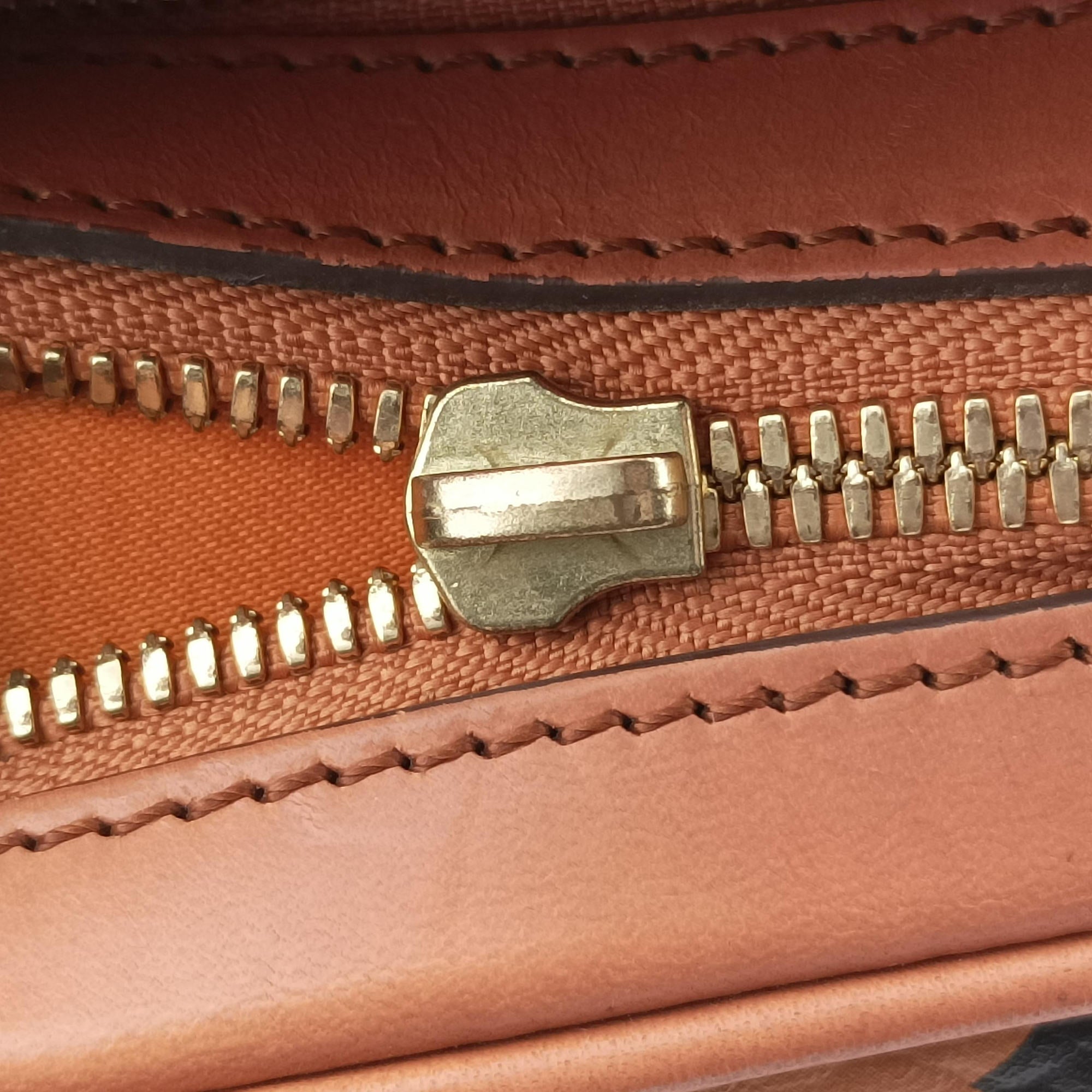 Vintage MCM Logogram business Brown Leather  handbag | stylenewstar