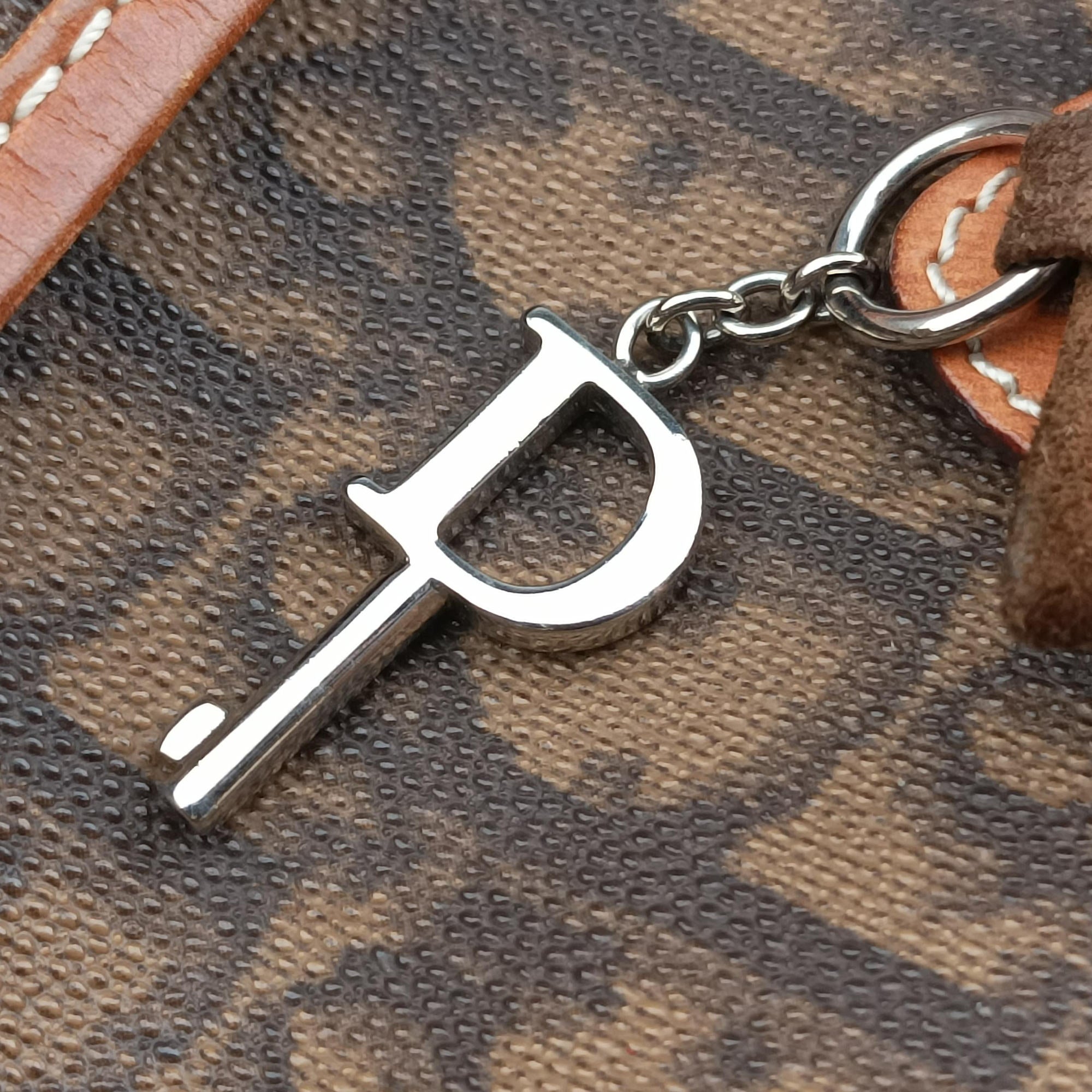 Pre-owned Christian Dior Trotter Romantique  Bow Brown×Multicolour PVC coated canvas×Leather  handbag | stylenewstar