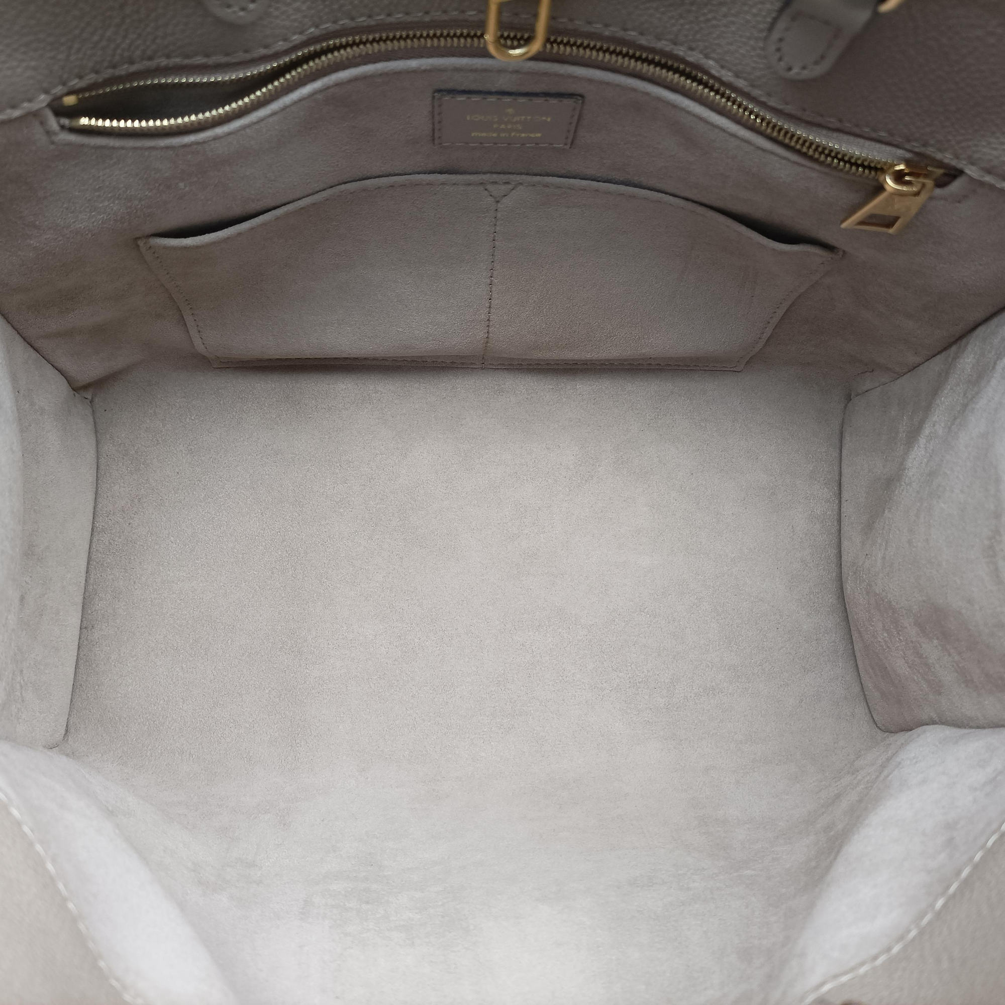 Pre-owned Louis Vuitton OntheGo MM Beige Monogram Empreinte M45607 shoulderbag | stylenewstar
