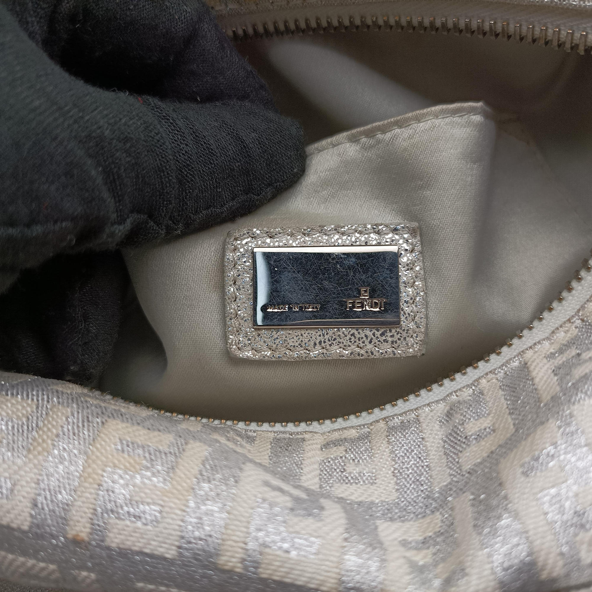 Secondhand Fendi Zucchino Glitter Logo Silver canvas 8BL068 handbag | stylenewstar