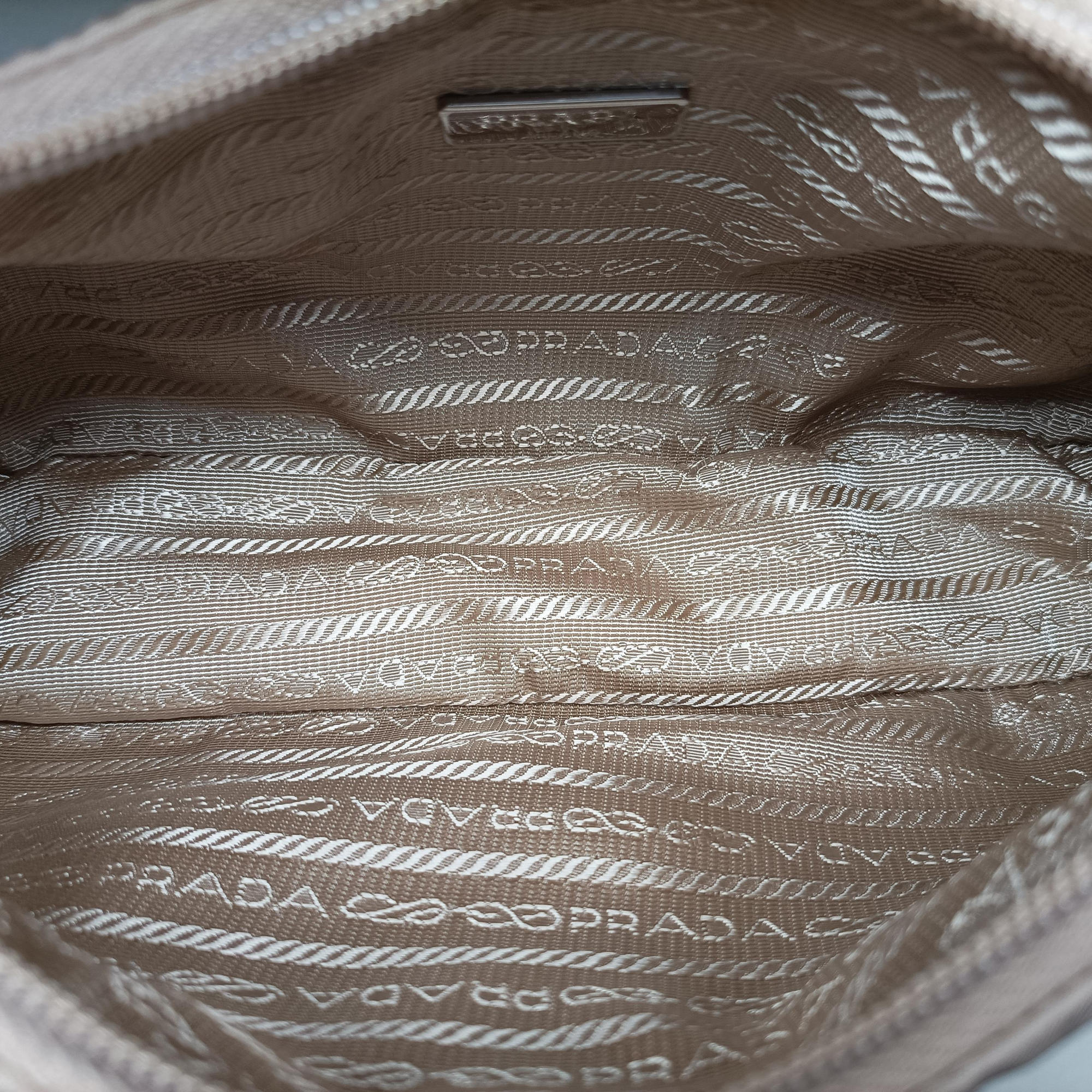 Vintage Prada Re-Edition 2005 Re-Nylon Bag Beige nylon 1BH204 handbag | stylenewstar