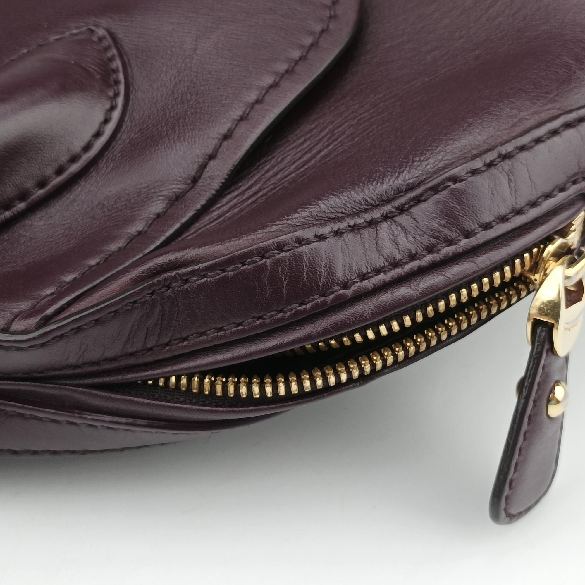 Pre-owned Ferragamo fiamma Burgundy Leather  handbag | stylenewstar