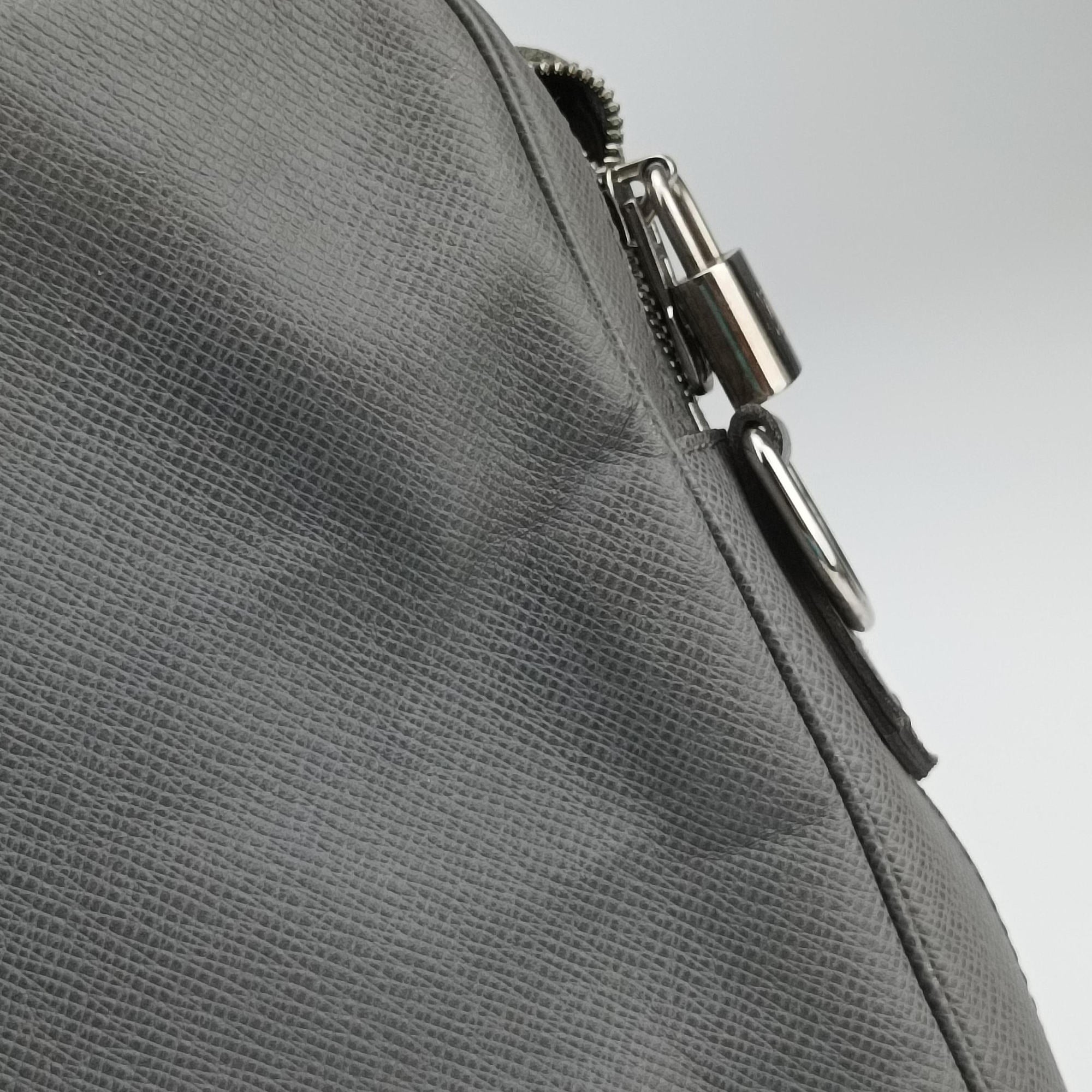Pre-owned Louis Vuitton Port Document Voyage PM Glacier Taiga M30640 handbag | stylenewstar