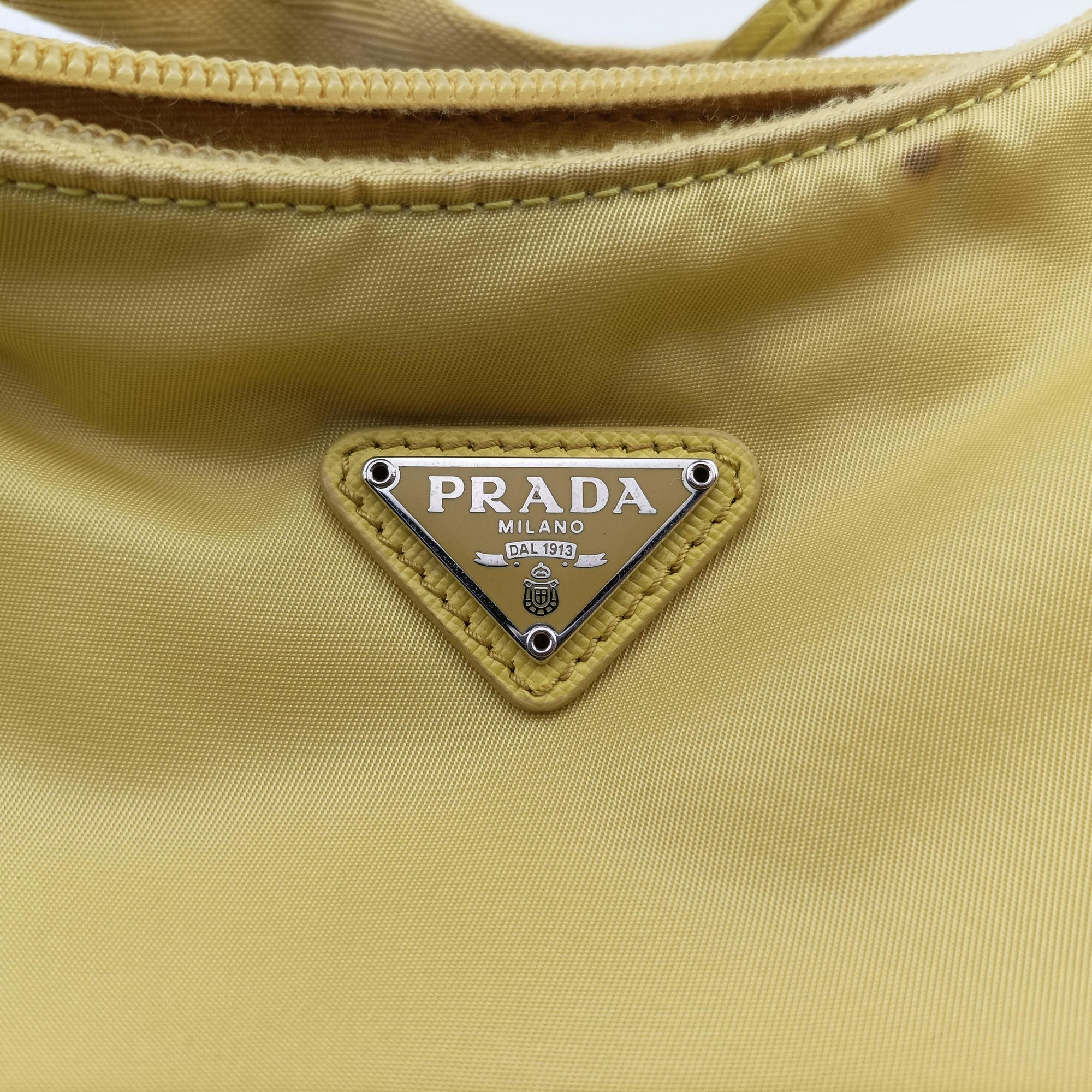 Pre-owned Prada Re-Edition2000 Yellow nylon 1NE515 handbag | stylenewstar