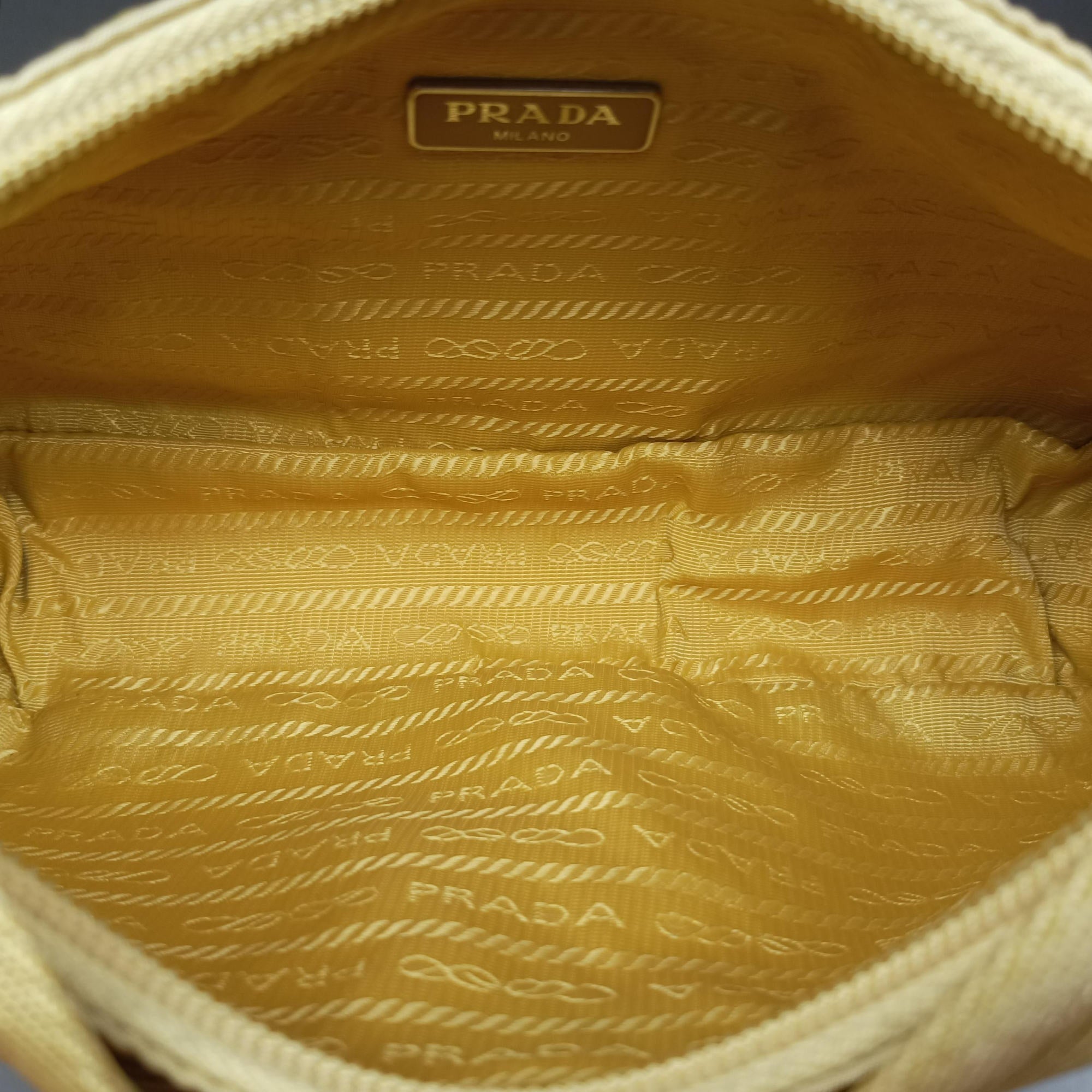 Pre-owned Prada Re-Edition2000 Yellow nylon 1NE515 handbag | stylenewstar