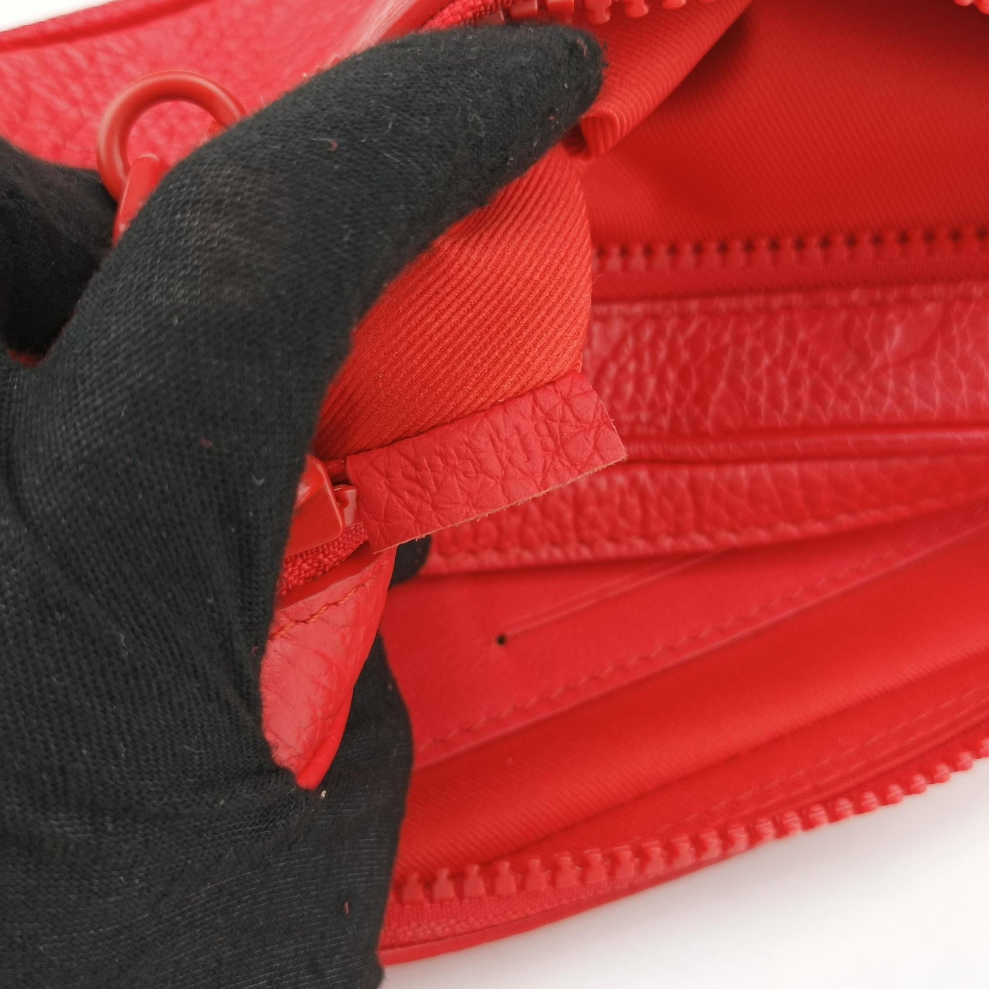 Vintage Louis Vuitton Pochette Volga Red Monogram Empreinte M53555 clutchbag | stylenewstar