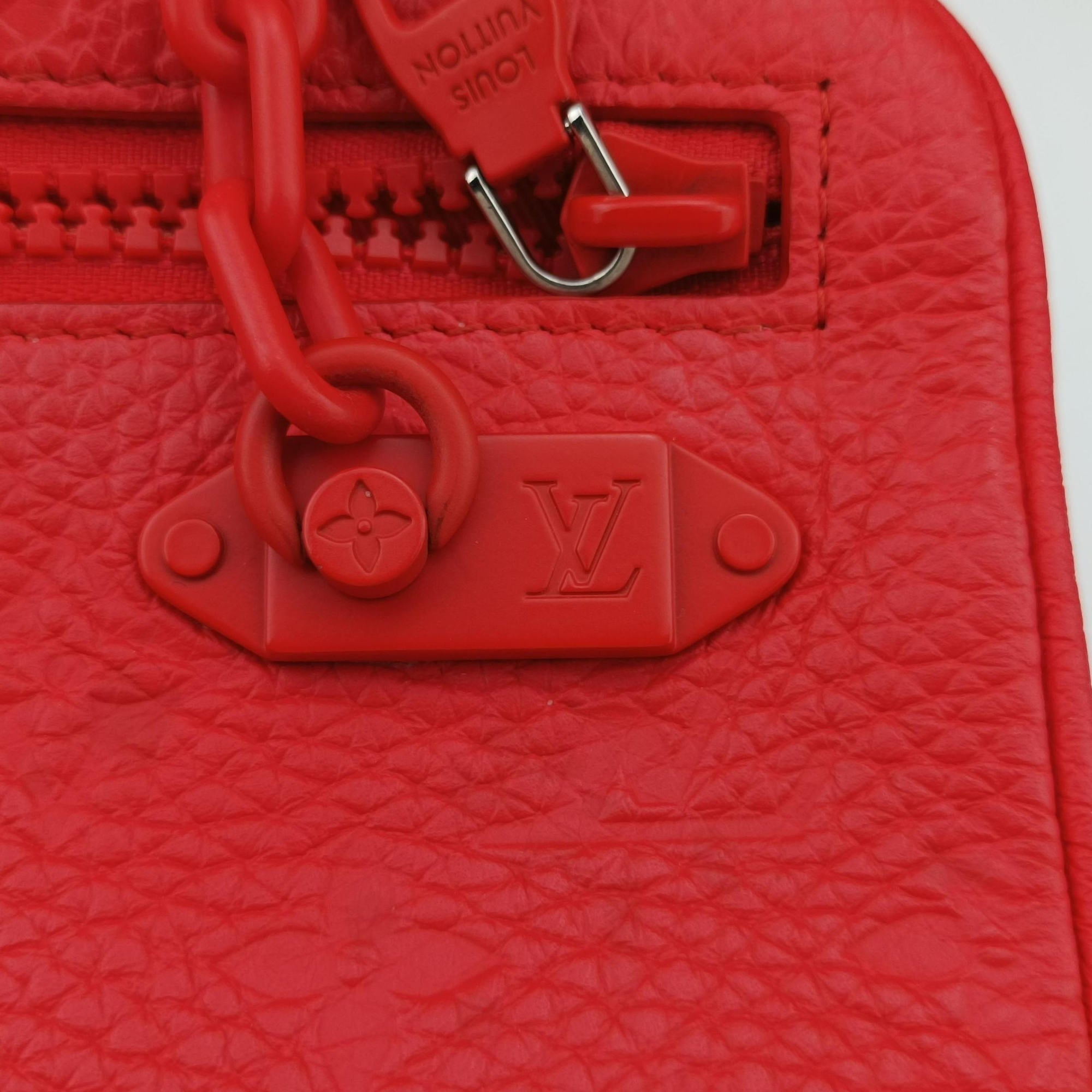 Vintage Louis Vuitton Pochette Volga Red Monogram Empreinte M53555 clutchbag | stylenewstar