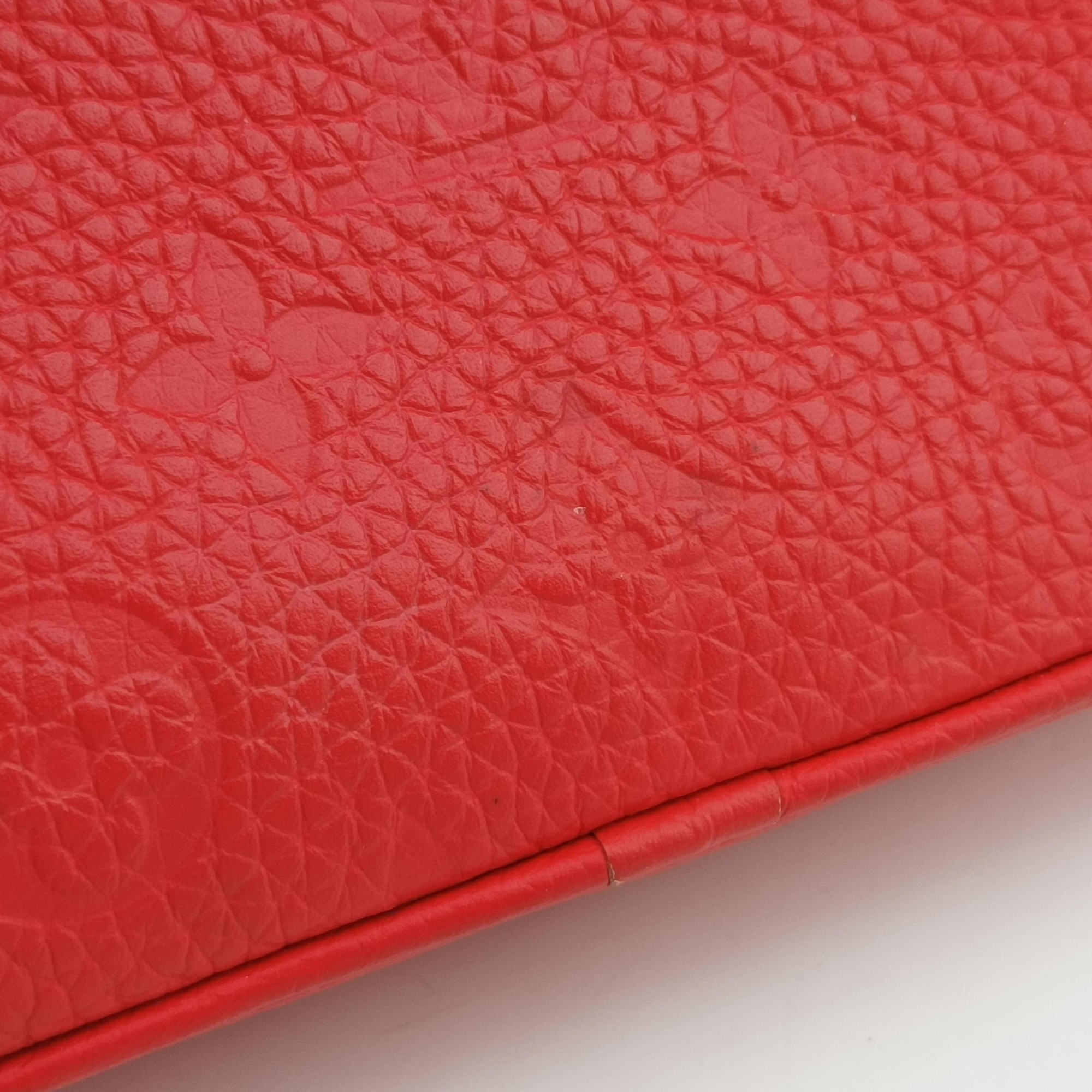 Vintage Louis Vuitton Pochette Volga Red Monogram Empreinte M53555 clutchbag | stylenewstar
