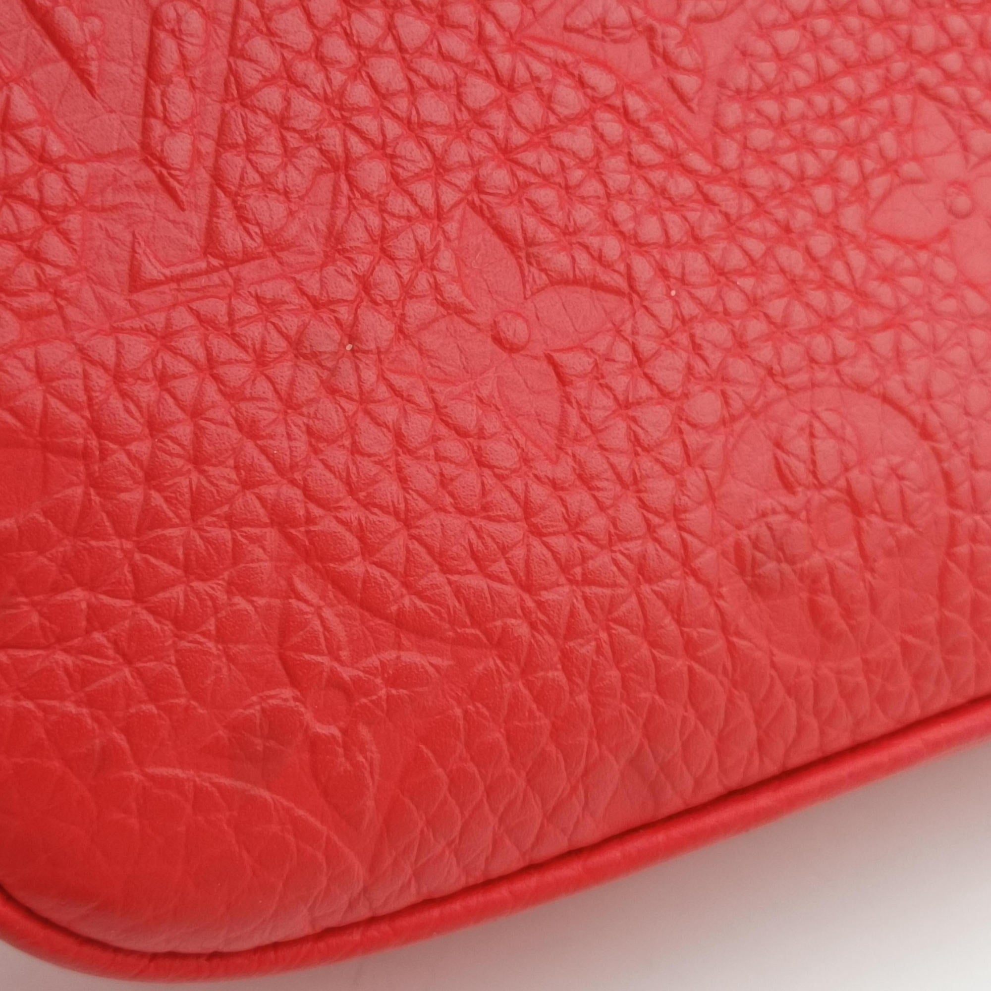 Vintage Louis Vuitton Pochette Volga Red Monogram Empreinte M53555 clutchbag | stylenewstar