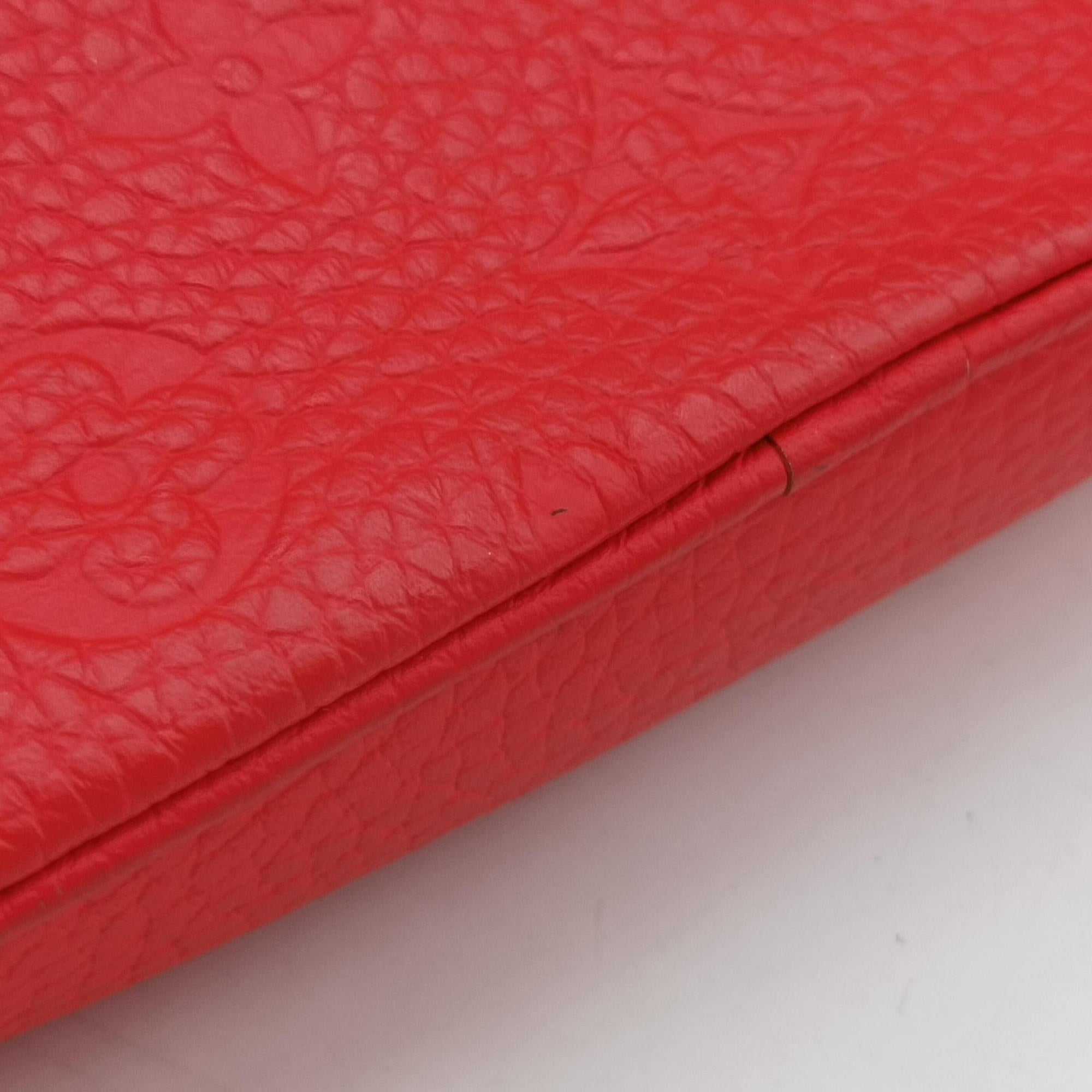 Vintage Louis Vuitton Pochette Volga Red Monogram Empreinte M53555 clutchbag | stylenewstar