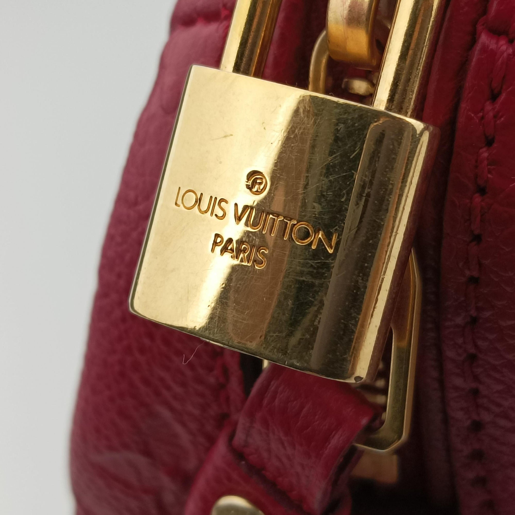 Pre-owned Louis Vuitton Speedy Bandouliere 25 Aurore Monogram Empreinte M40764 handbag | stylenewstar