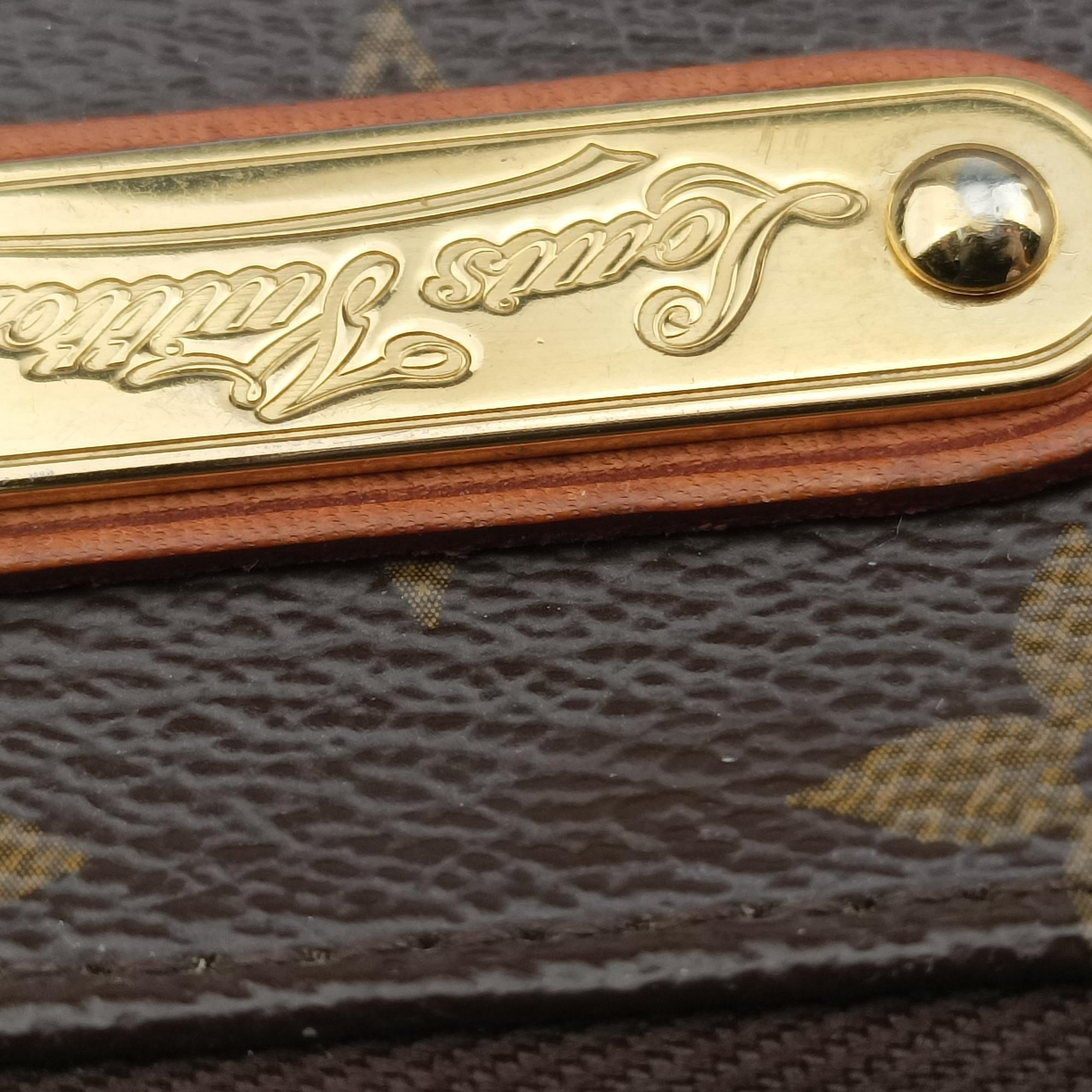 Pre-owned Louis Vuitton Pochette Mila MM brown Monogram Canvas M60094 handbag | stylenewstar