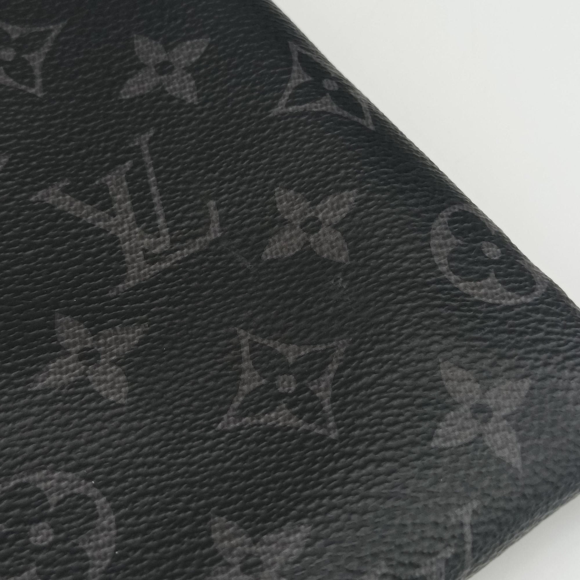 Secondhand Louis Vuitton Pochette Voyage MM Pacific Blue Monogram Eclipse PVC Coated Canvas M61692 clutchbag | stylenewstar