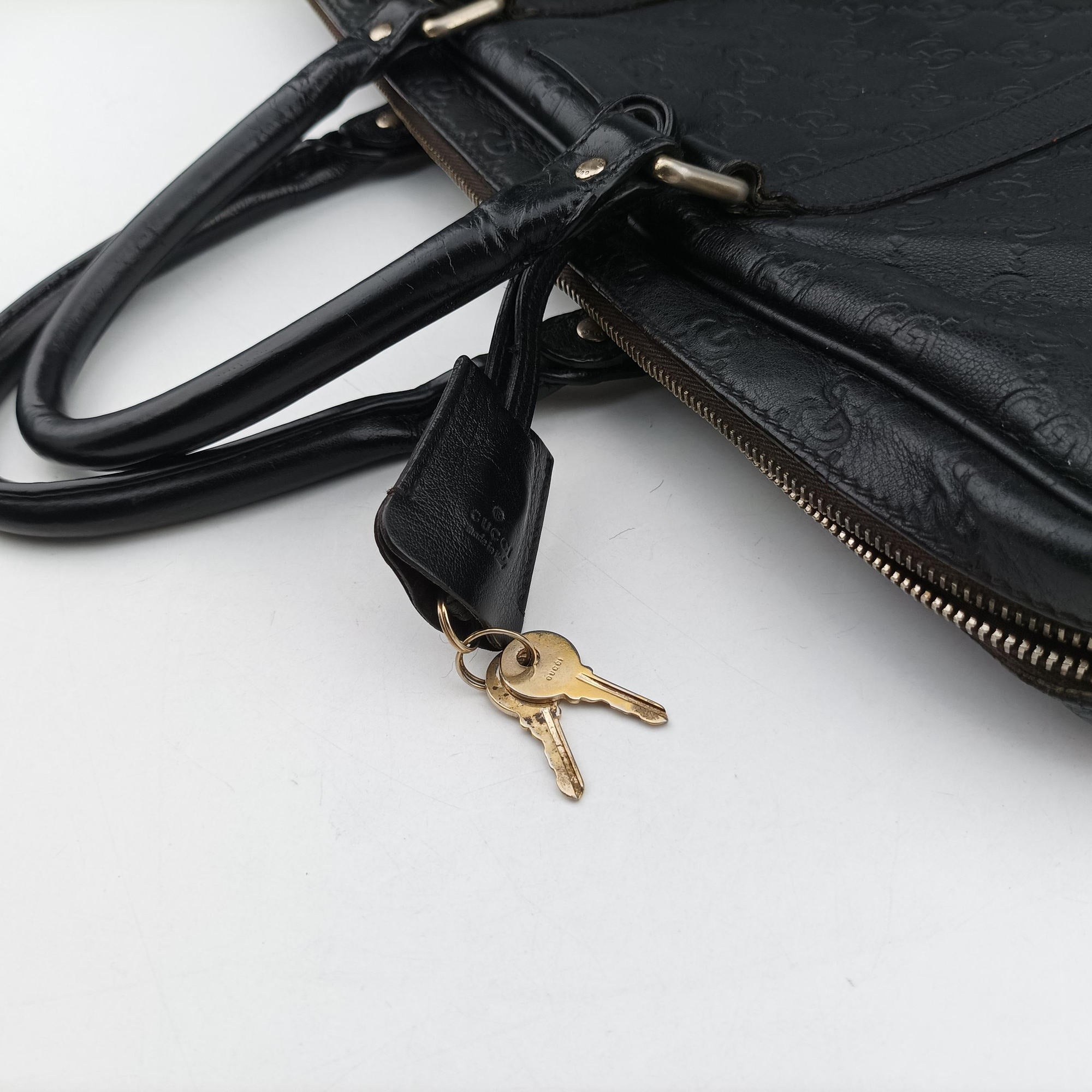 Secondhand Gucci Guccissima briefcase Black Leather 208463 handbag | stylenewstar