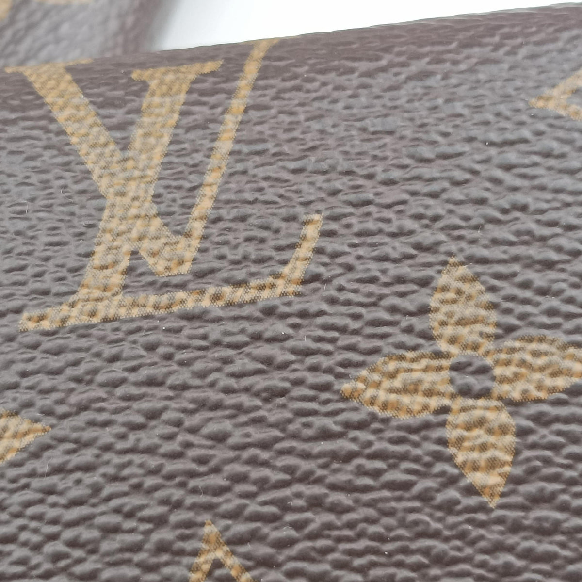 Secondhand Louis Vuitton Pochette Kirigami Brown Monogram Canvas M62034 clutchbag | stylenewstar